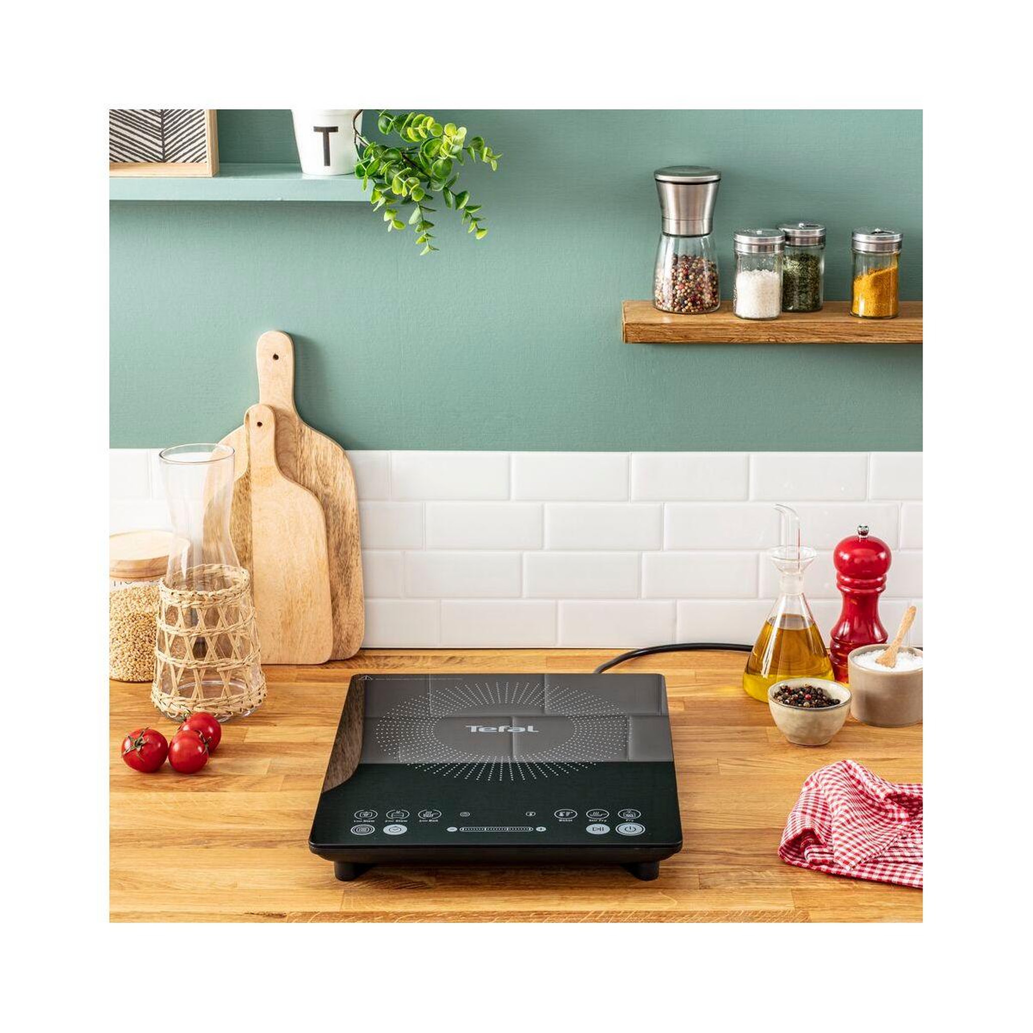 Voir la diapositive 4 : TEFAL Plaque IH2108E1