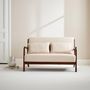 Voir la diapositive 2 : SWEEEK Banquette 2 places tissu beige. pieds bois d'hévéa teinté noyer clair. droit fixe. pieds compas scandinave