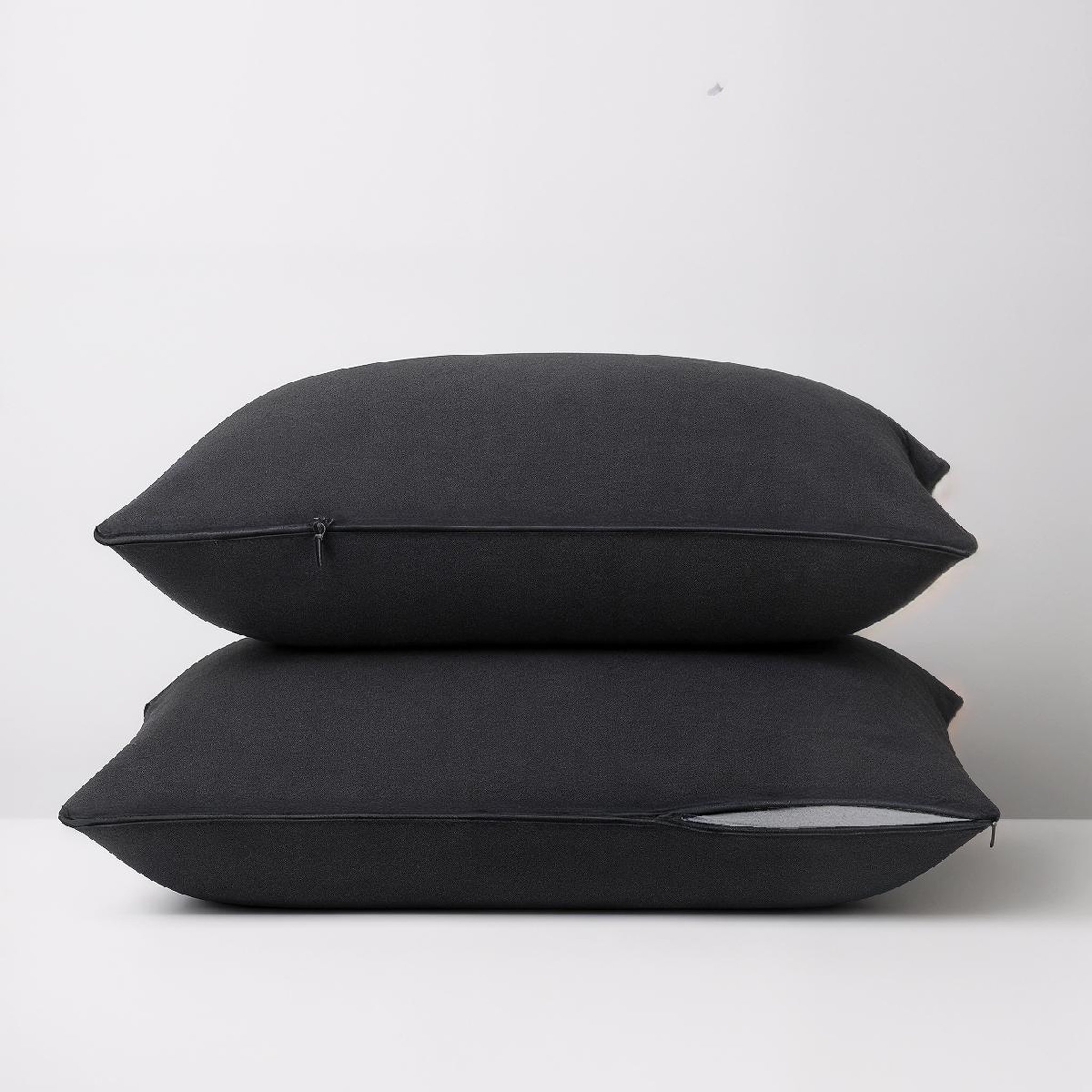 DODO Lot de 2 Taies d'oreiller 2 en 1 - Alèse absorbante intégrée - Coloris Carbone. Coloris disponibles : Noir