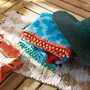 ACTUEL Drap de plage en coton 420 gr/m2 imprimés mosaïques et pompons rouges PRETTY BLUE