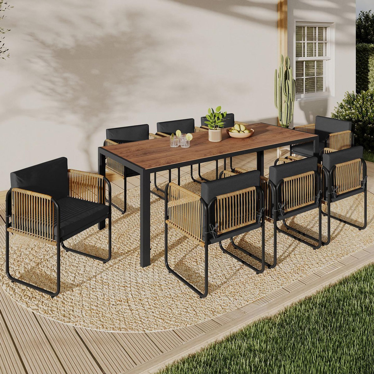 ID MARKET Salon de jardin RIO table 190 CM et 8 chaises structure métal noir, cordage effet rotin clair et coussins noirs