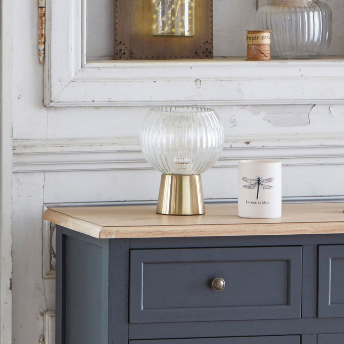 Lampe à poser verre et socle en métal coloris or 