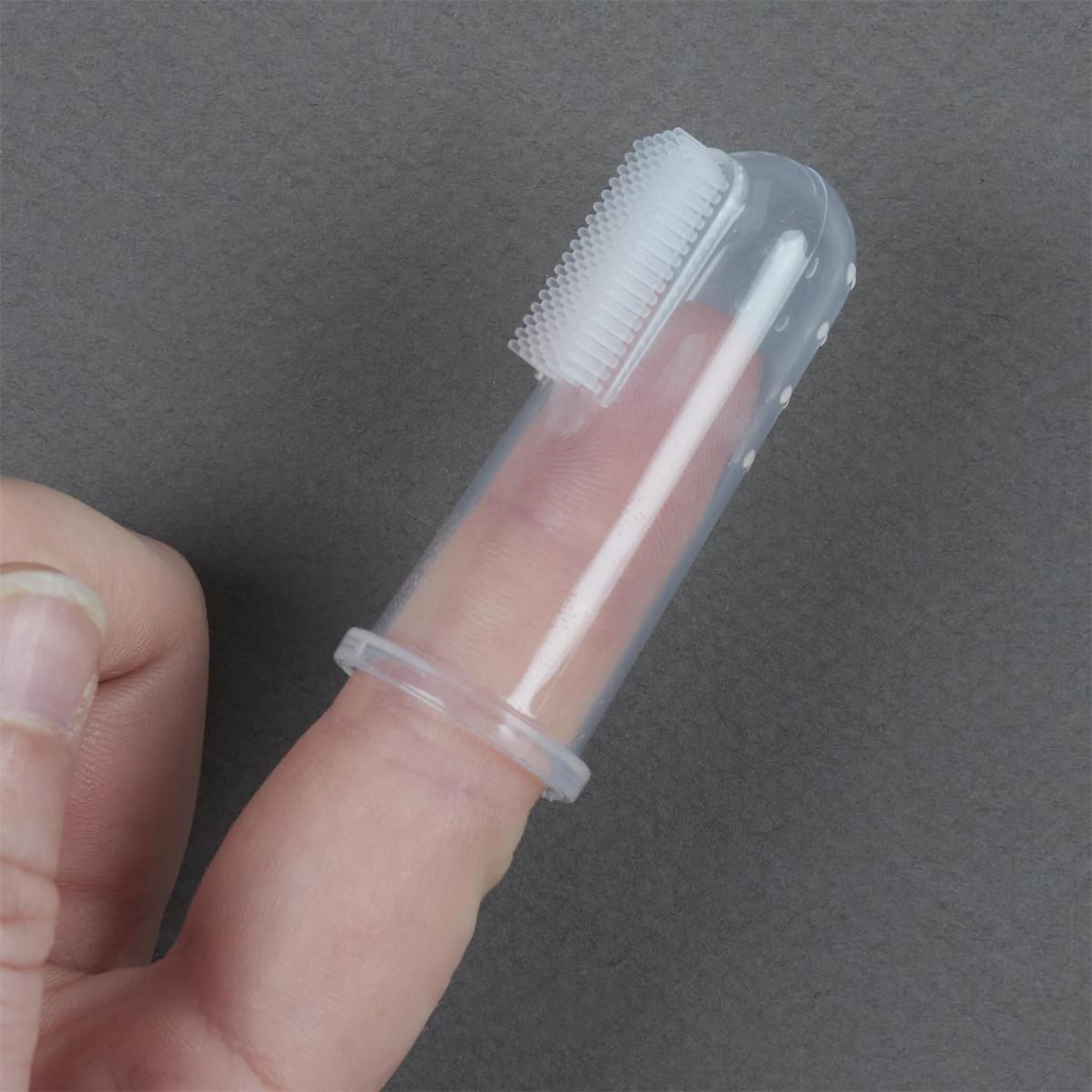 Voir la diapositive 5 : Tom & Zoé Brosse à dents bébé  silicone  5cm transparent