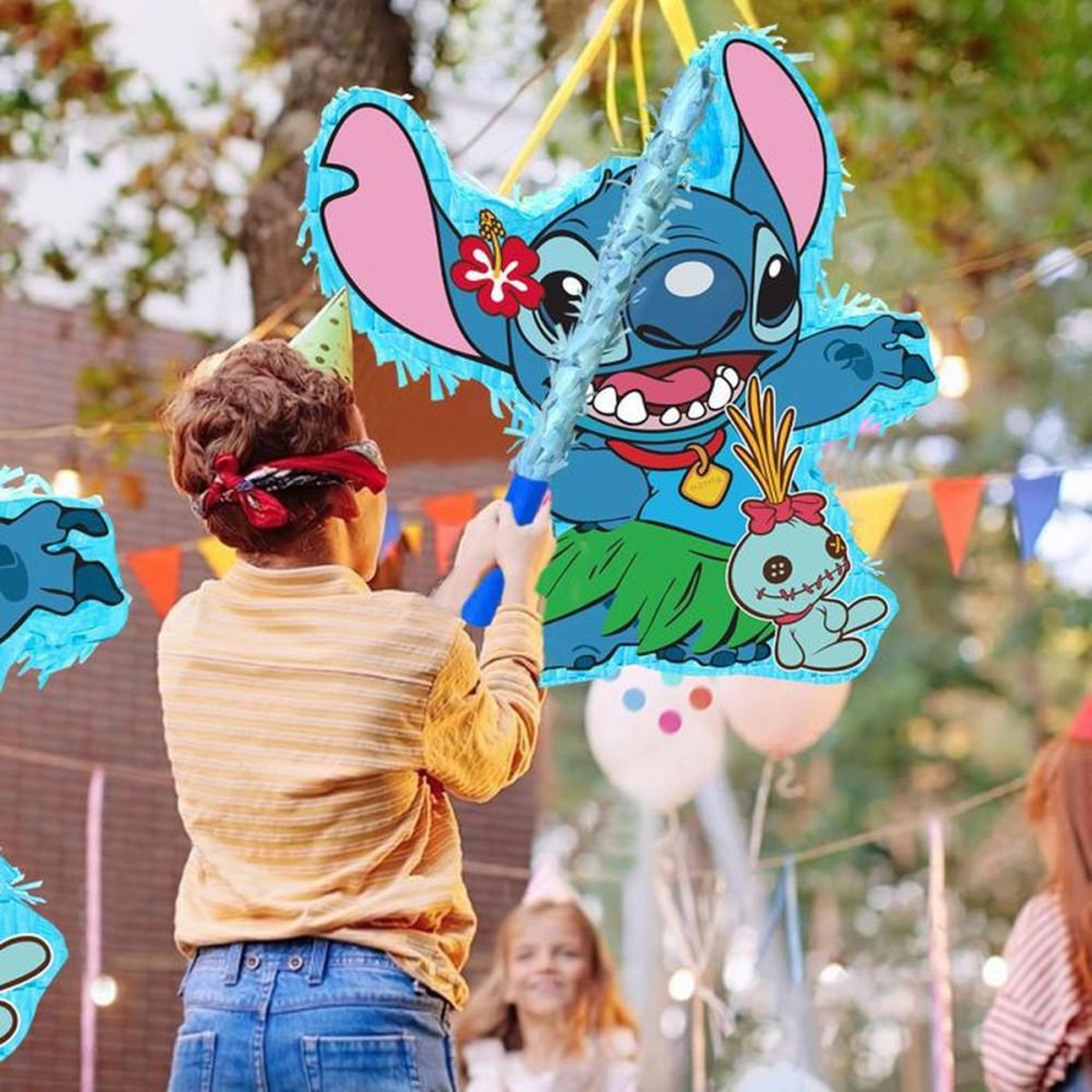Voir la diapositive 3 : Piñata Stitch multicolore pour fête enfant avec masque et bâton, décorations Disney, franges festives, à remplir, 37 x 20 cm