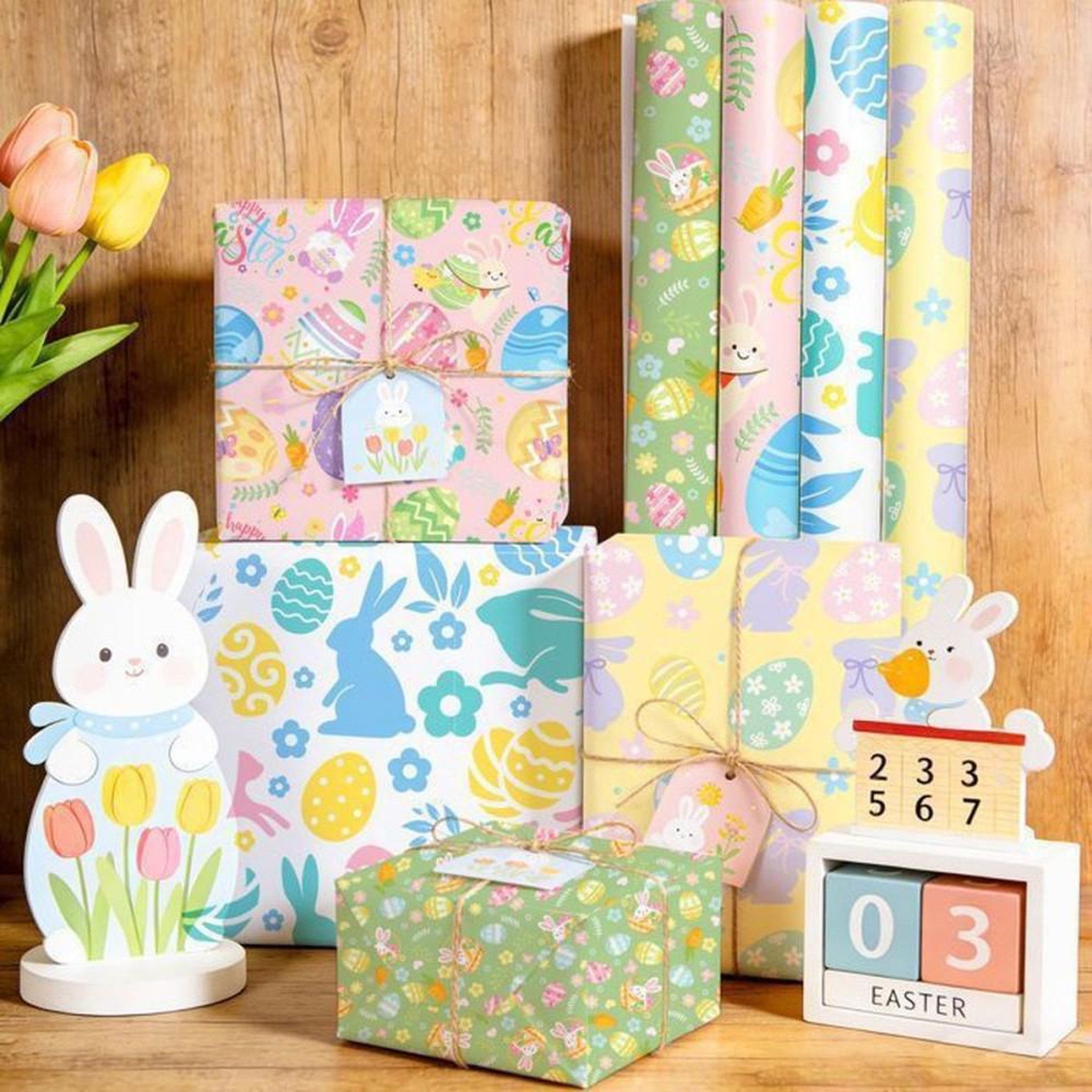 Voir la diapositive 5 : Papier cadeau de Pâques en rouleaux 40 cm x 3 m, lot de 4 motifs lapins et œufs multicolores