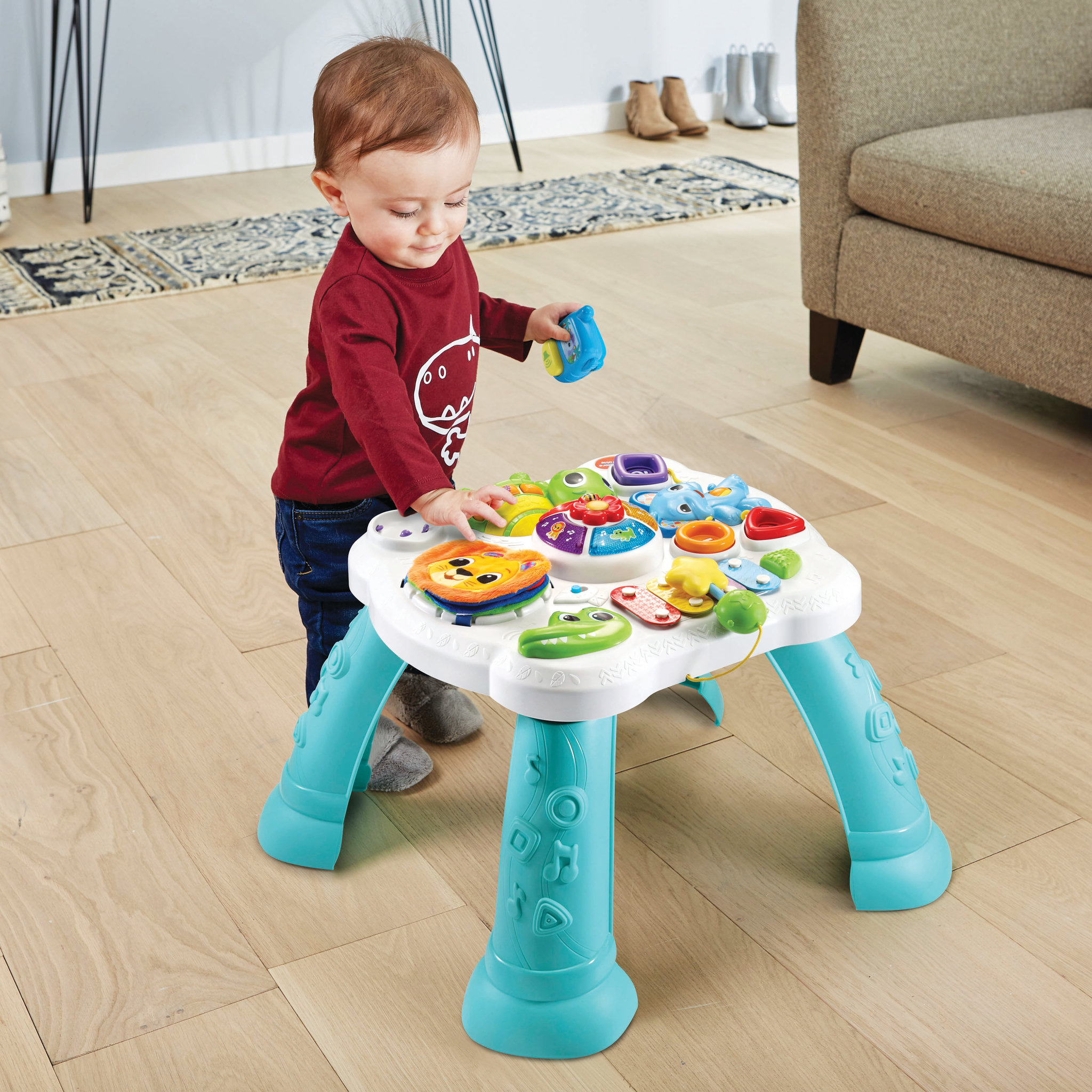 Voir la diapositive 2 : VTECH Table d'activités sensorielle des P'tits loulous