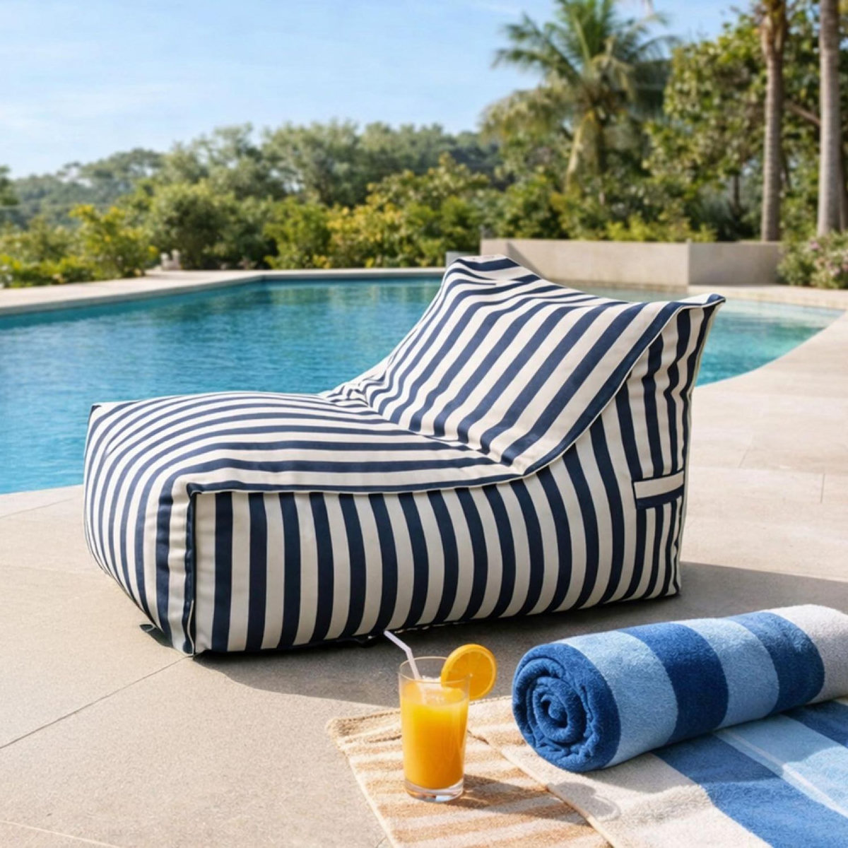 CONCEPT USINE Pouf d'extérieur rayé bleu déperlant et anti-UV – 100x65x65 cm POSITANO