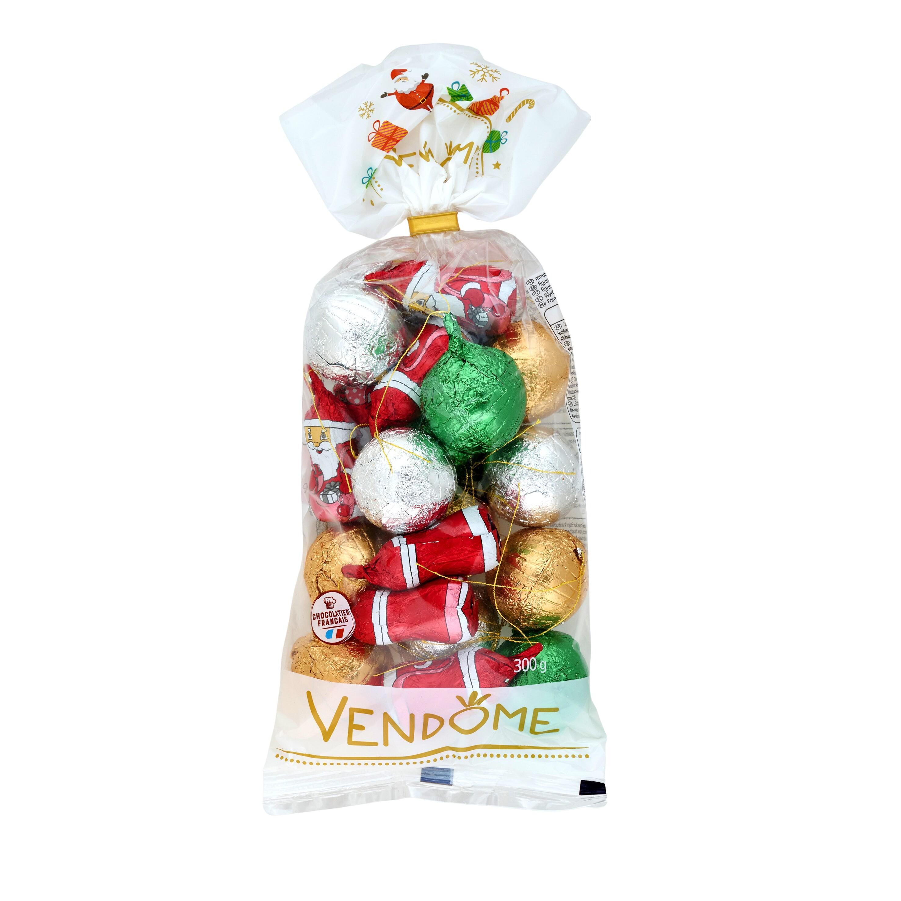 Voir la diapositive 3 : VENDOME Moulages Père Noël et boules de Noël en chocolat 300g