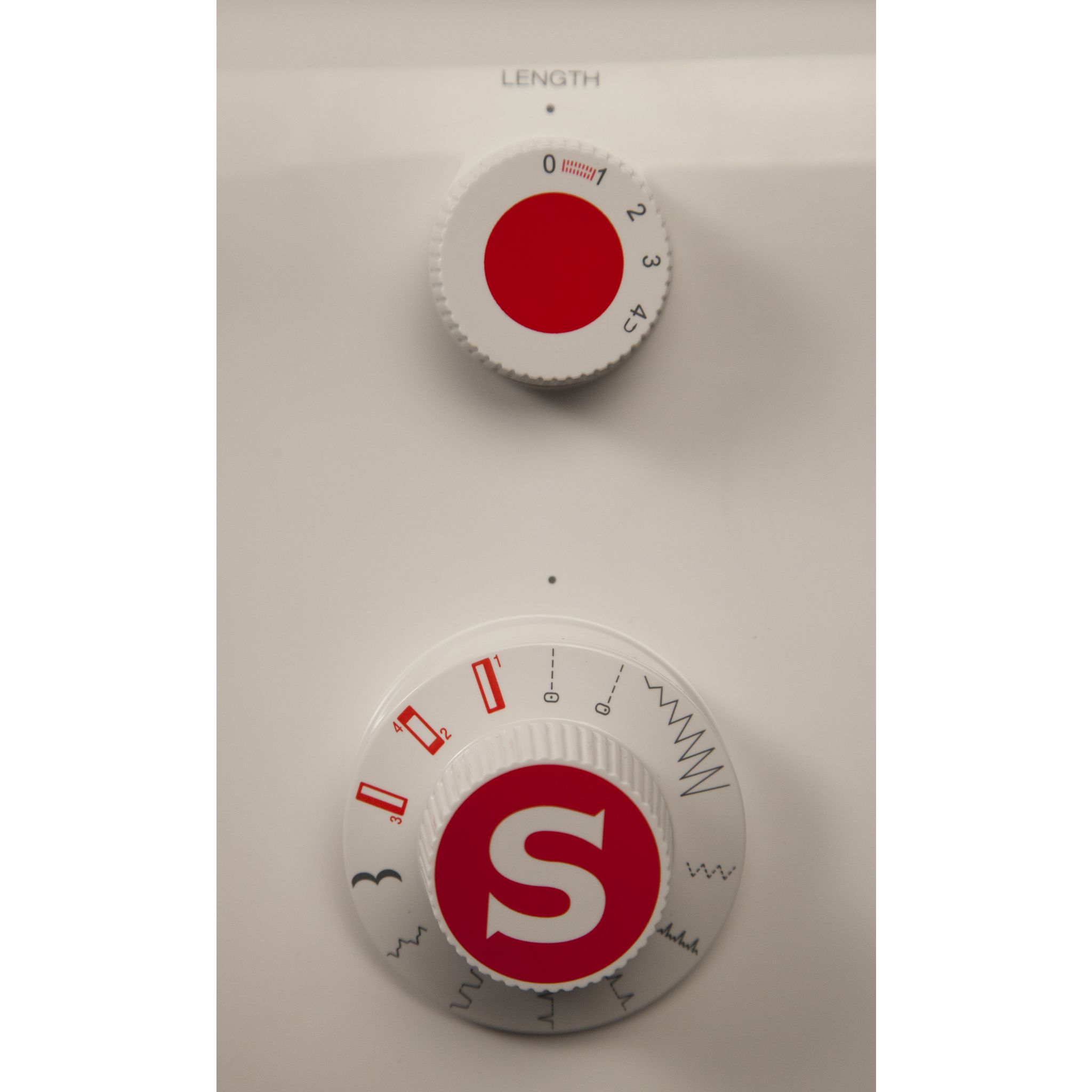 Voir la diapositive 4 : SINGER Machine à coudre Initiale