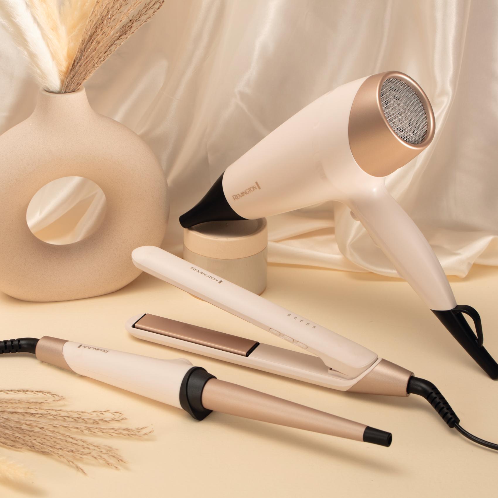 Voir la diapositive 7 : REMINGTON Sèche cheveux avec diffuseur fonction ionique D4740 - Champagne