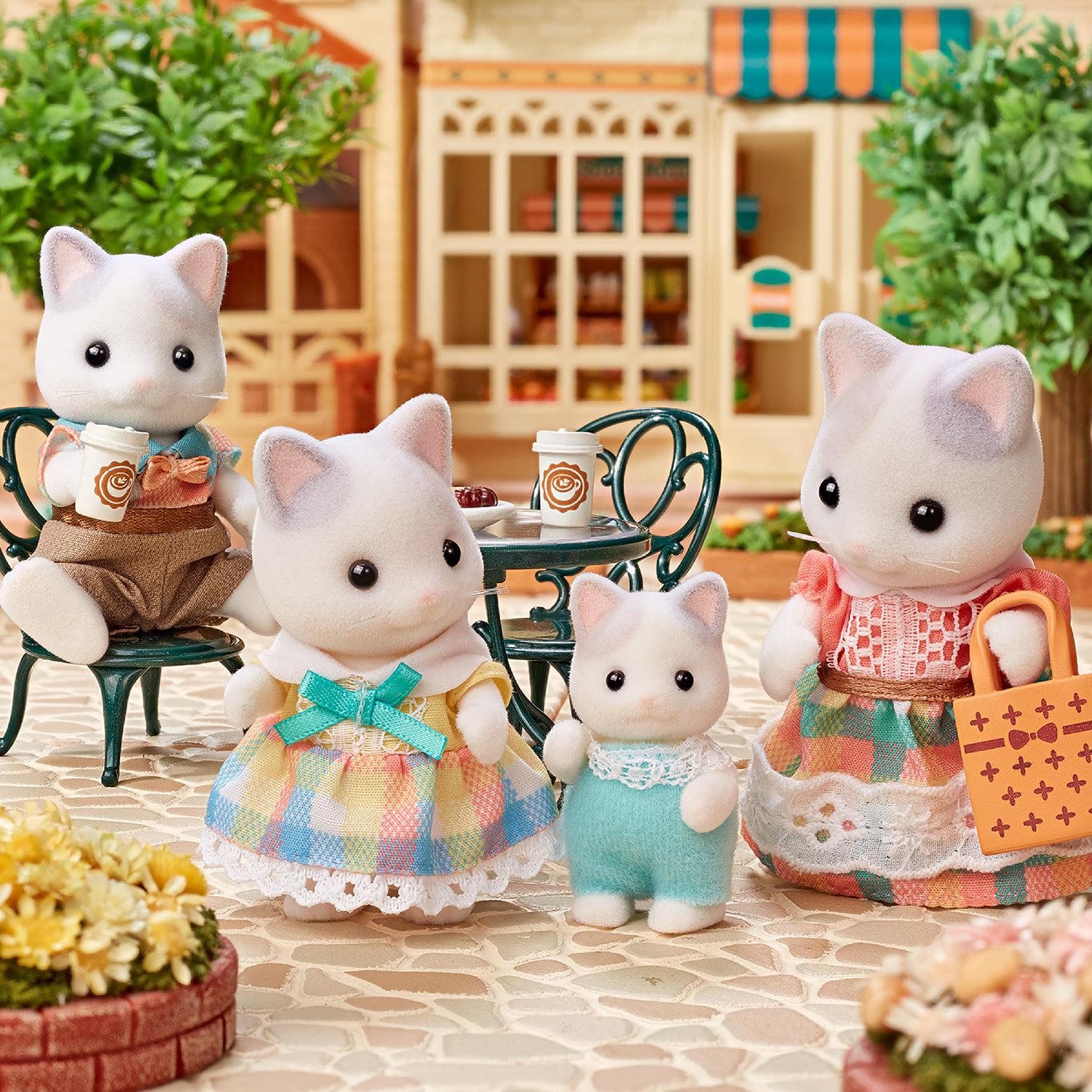 Voir la diapositive 3 : EPOCH D'ENFANCE La Famille Lapin Crème