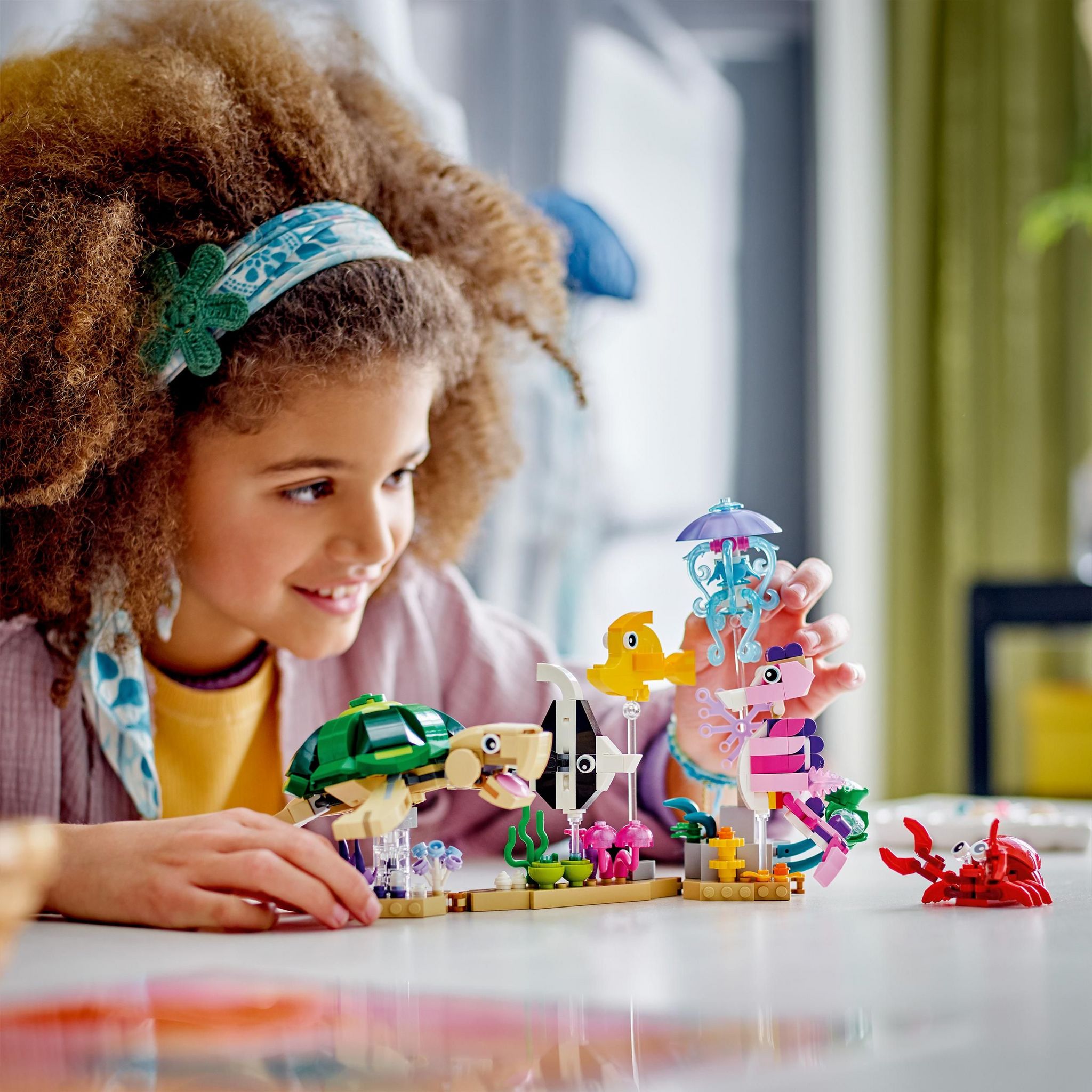 Voir la diapositive 6 : LEGO Creator 31158 - Les Animaux Marins 3 en 1