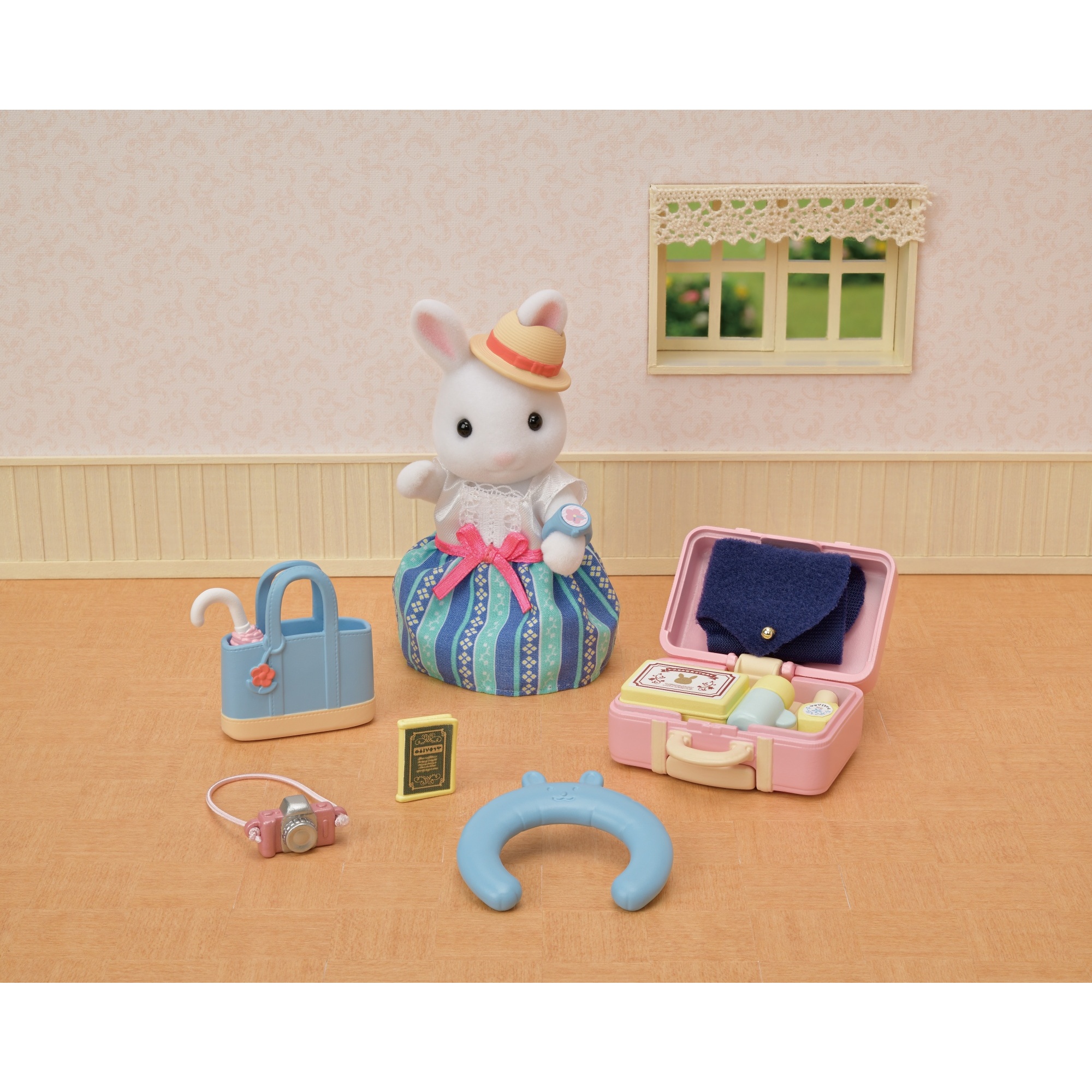 Voir la diapositive 6 : La maman lapin neige et sa valise de weekend