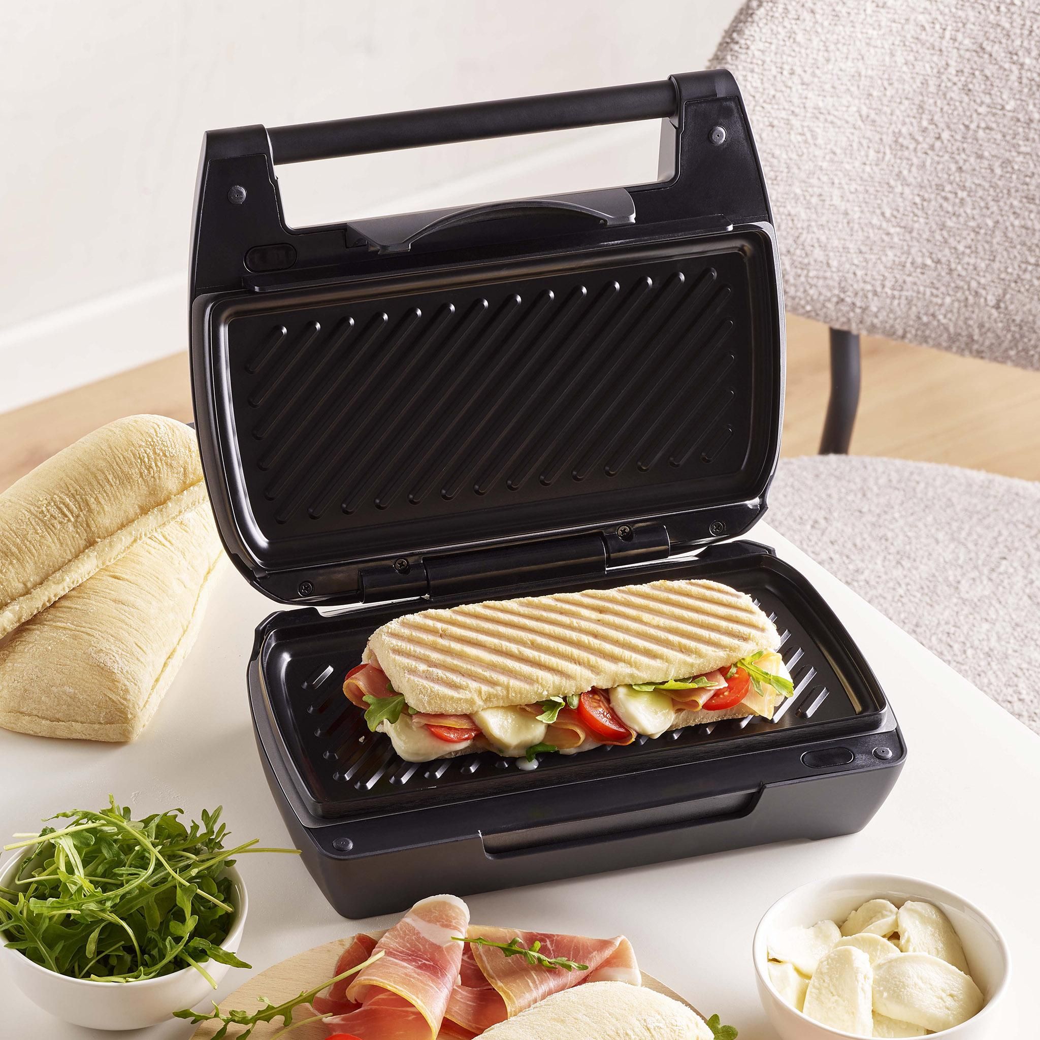 Voir la diapositive 12 : LAGRANGE Gaufrier 028362 - Noir