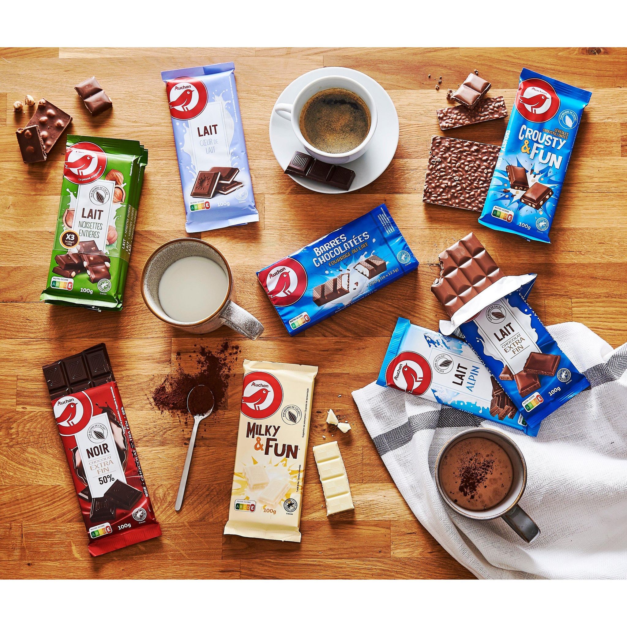 Voir la diapositive 2 : AUCHAN Tablette de chocolat au lait avec noisettes entières 3 pièces 3x100g