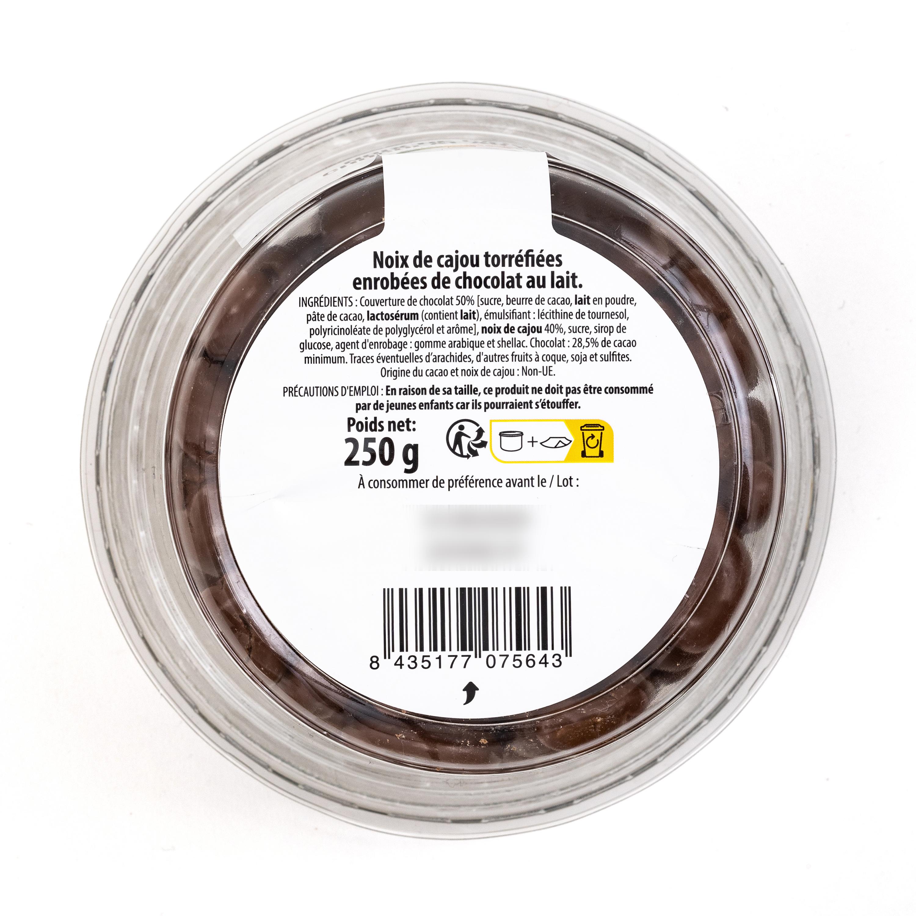 Voir la diapositive 2 : AUCHAN Noix de cajou chocolat au lait 250g