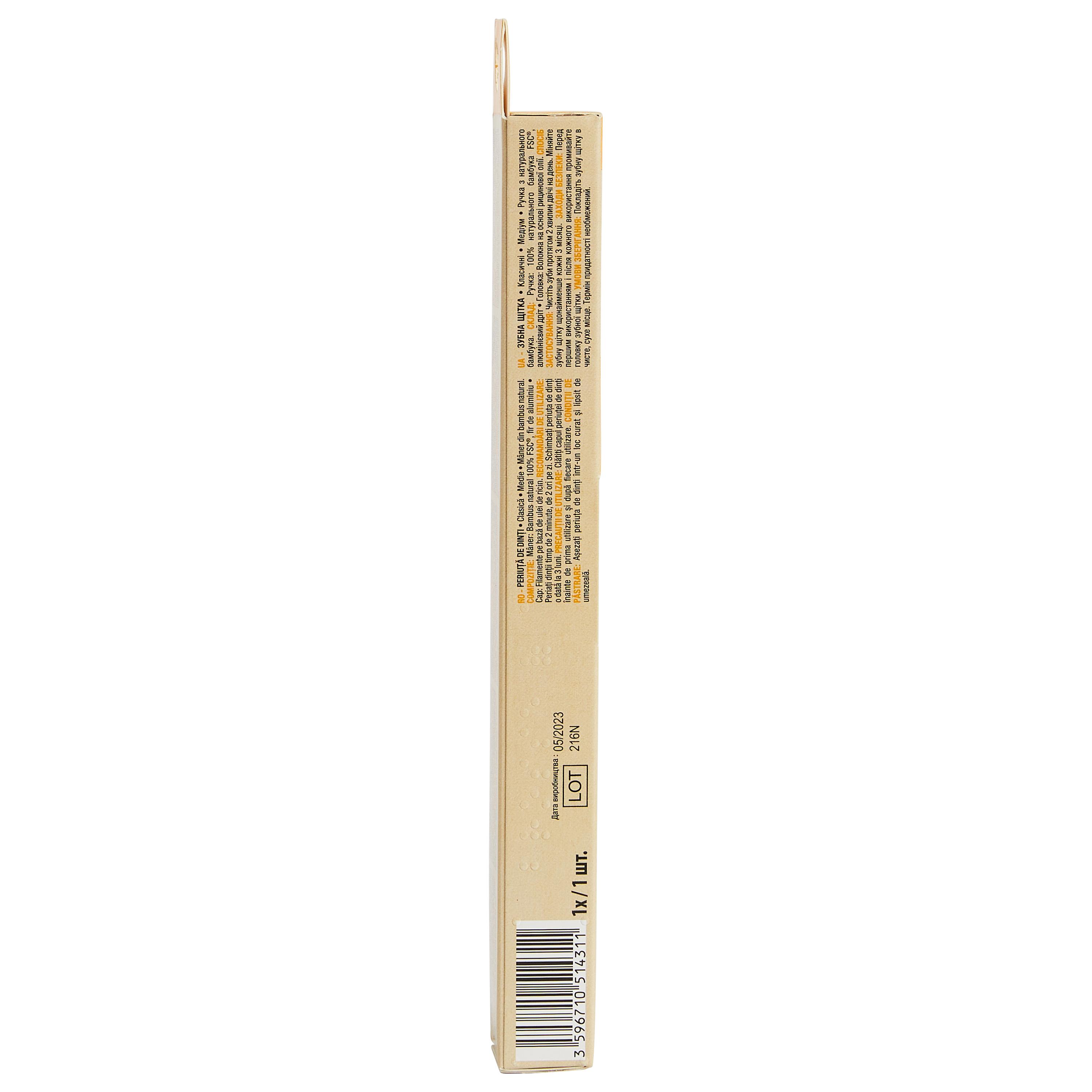 Voir la diapositive 3 : AUCHAN Brosse à dents classique medium en bambou 1 brosse