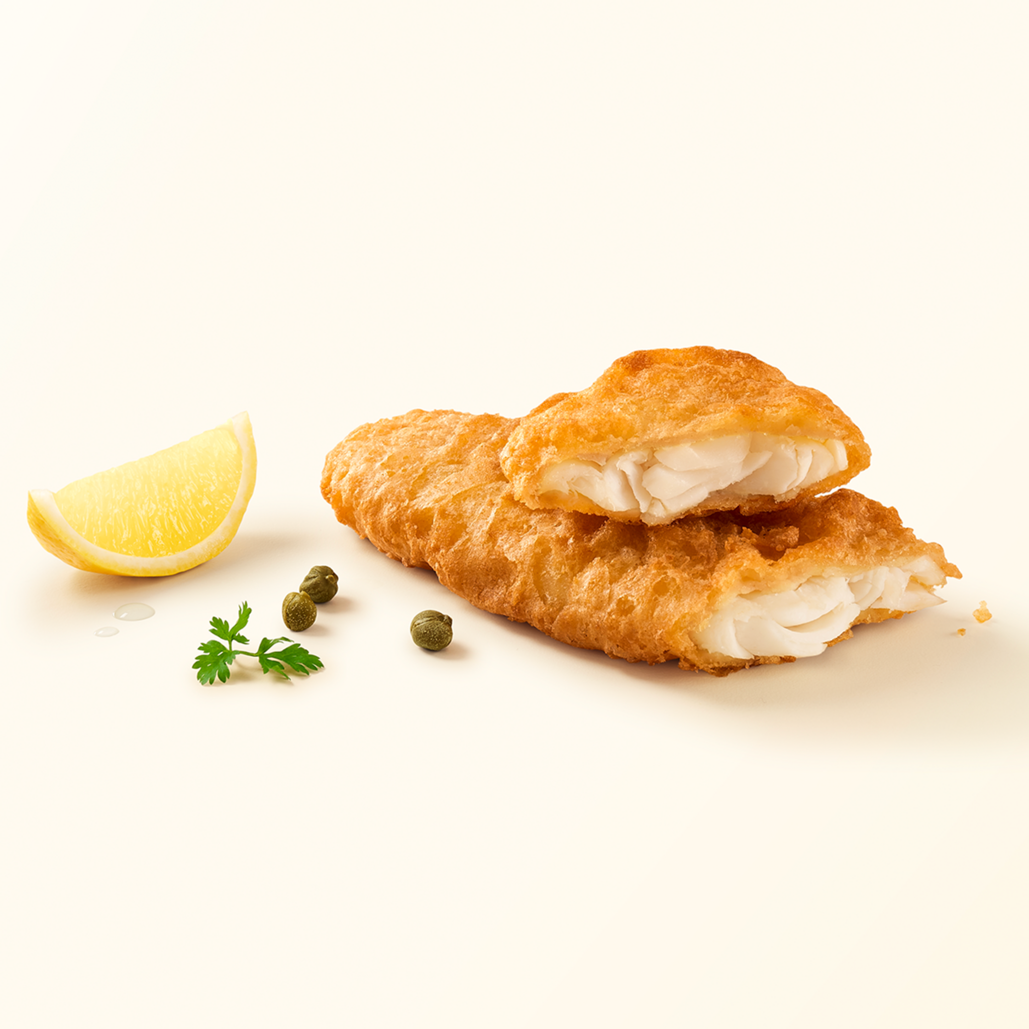 Voir la diapositive 2 : AUCHAN LE POISSONNIER Filets de merlu blanc façon fish & chips 2 pièces 200g