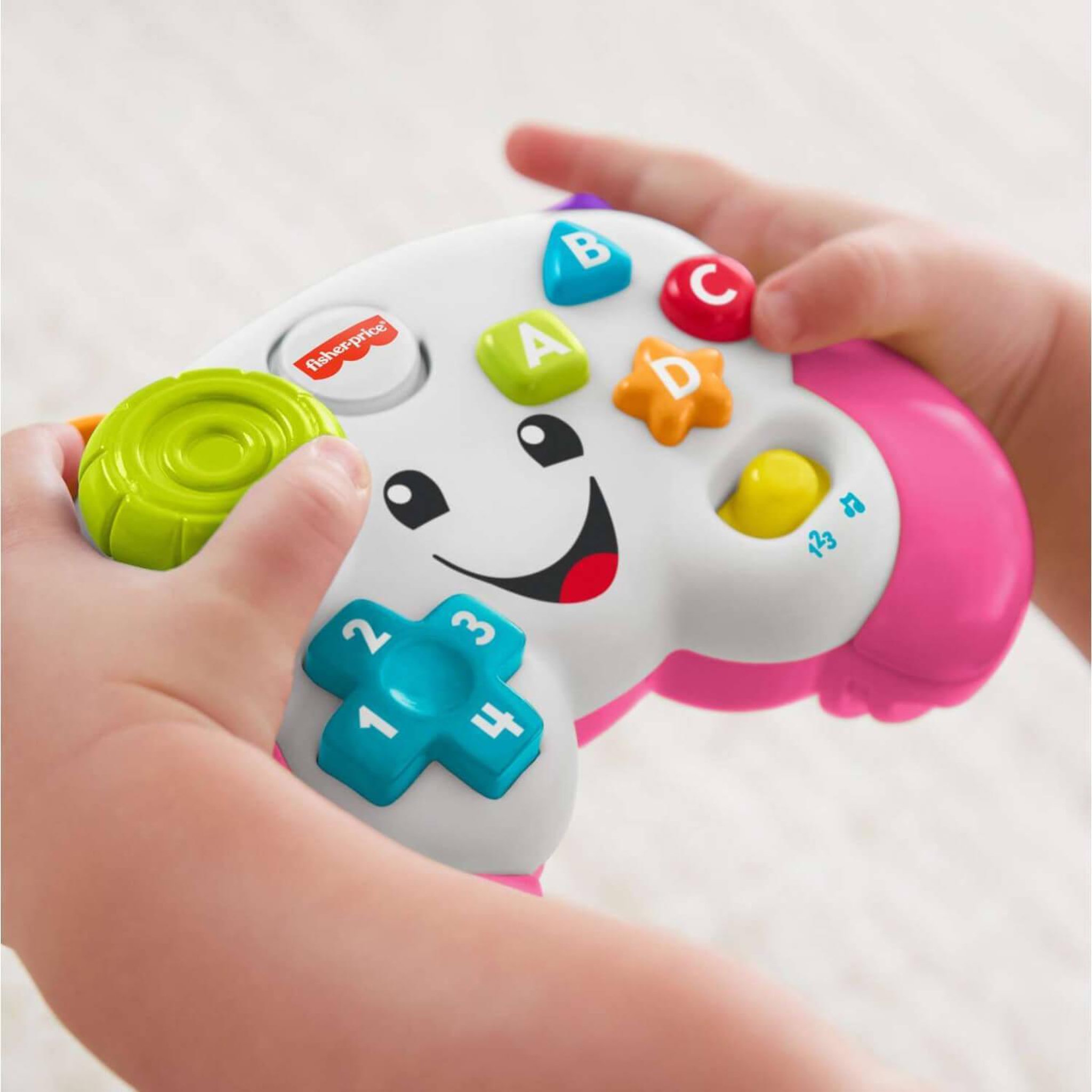 Voir la diapositive 2 : FISHER PRICE Manette De Jeu Rose