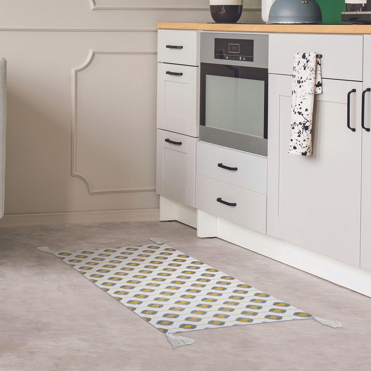 The Home Deco Factory Tapis à pompons modèle Zeste - Jaune/Noir/Blanc - 50 x 70 cm