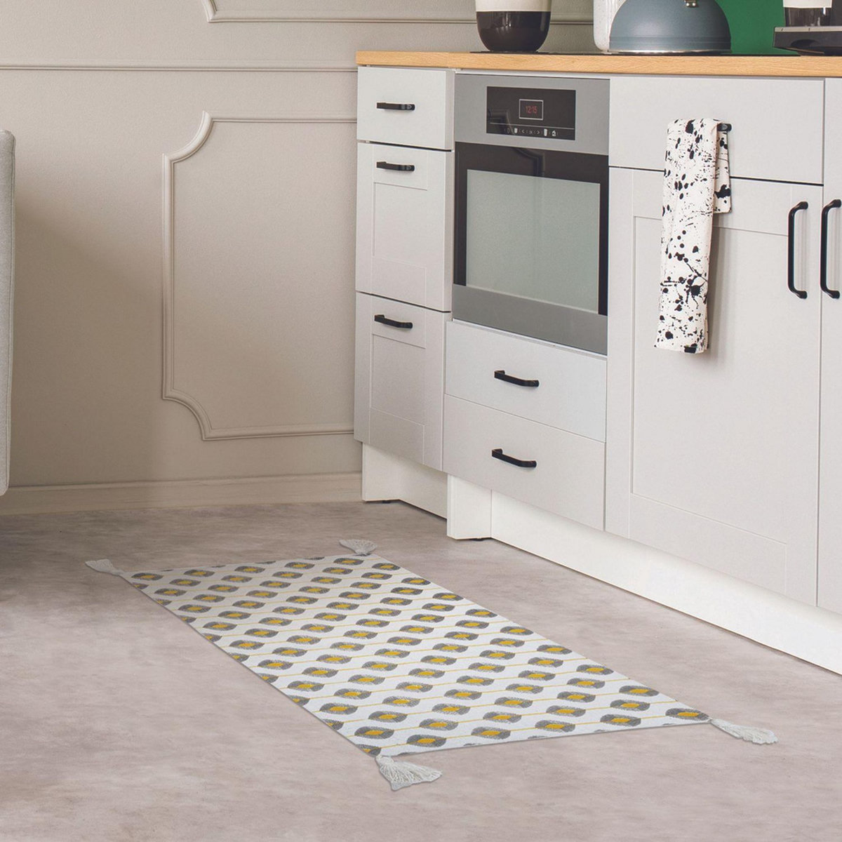 The Home Deco Factory Tapis à pompons modèle Zeste - Jaune/Noir/Blanc - 50 x 70 cm