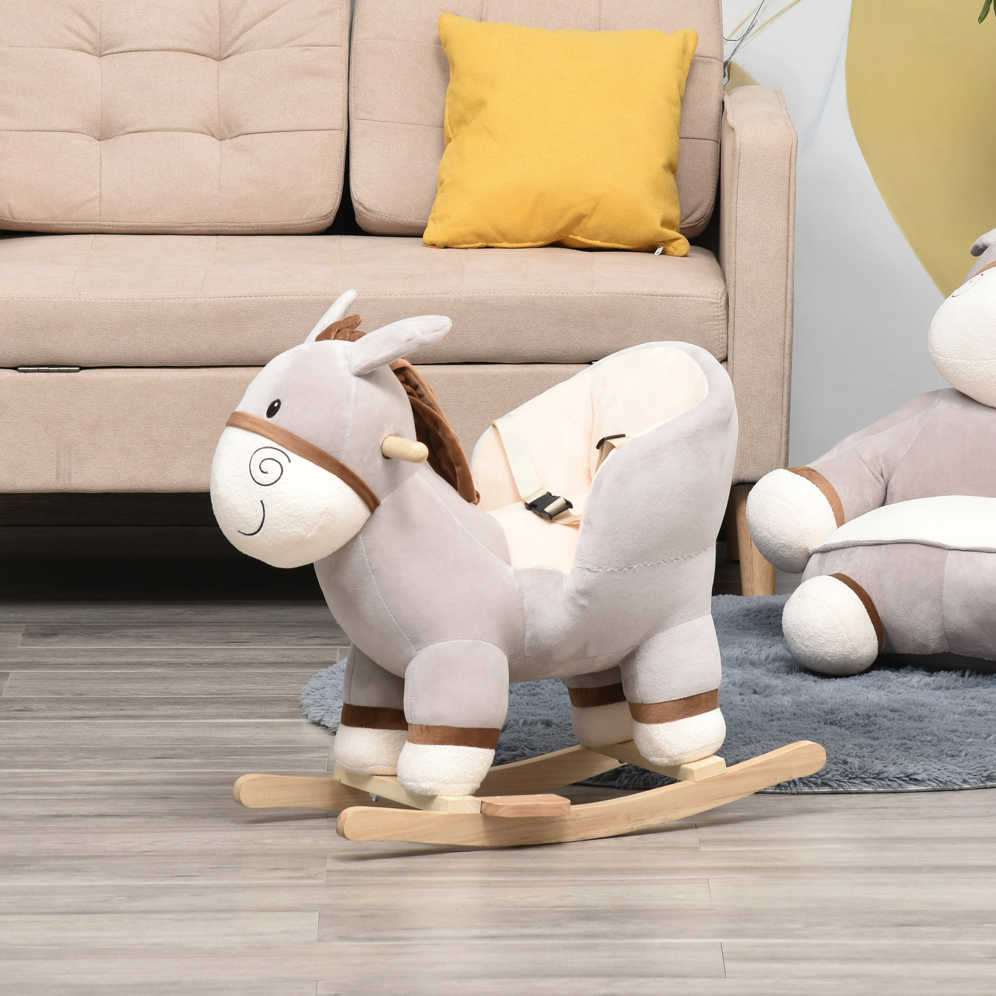 Voir la diapositive 2 : HOMCOM Cheval à bascule modèle âne fonction musicale selle grand confort peluche courte douce bois peuplier gris dim. 61L x 34l x 58H cm