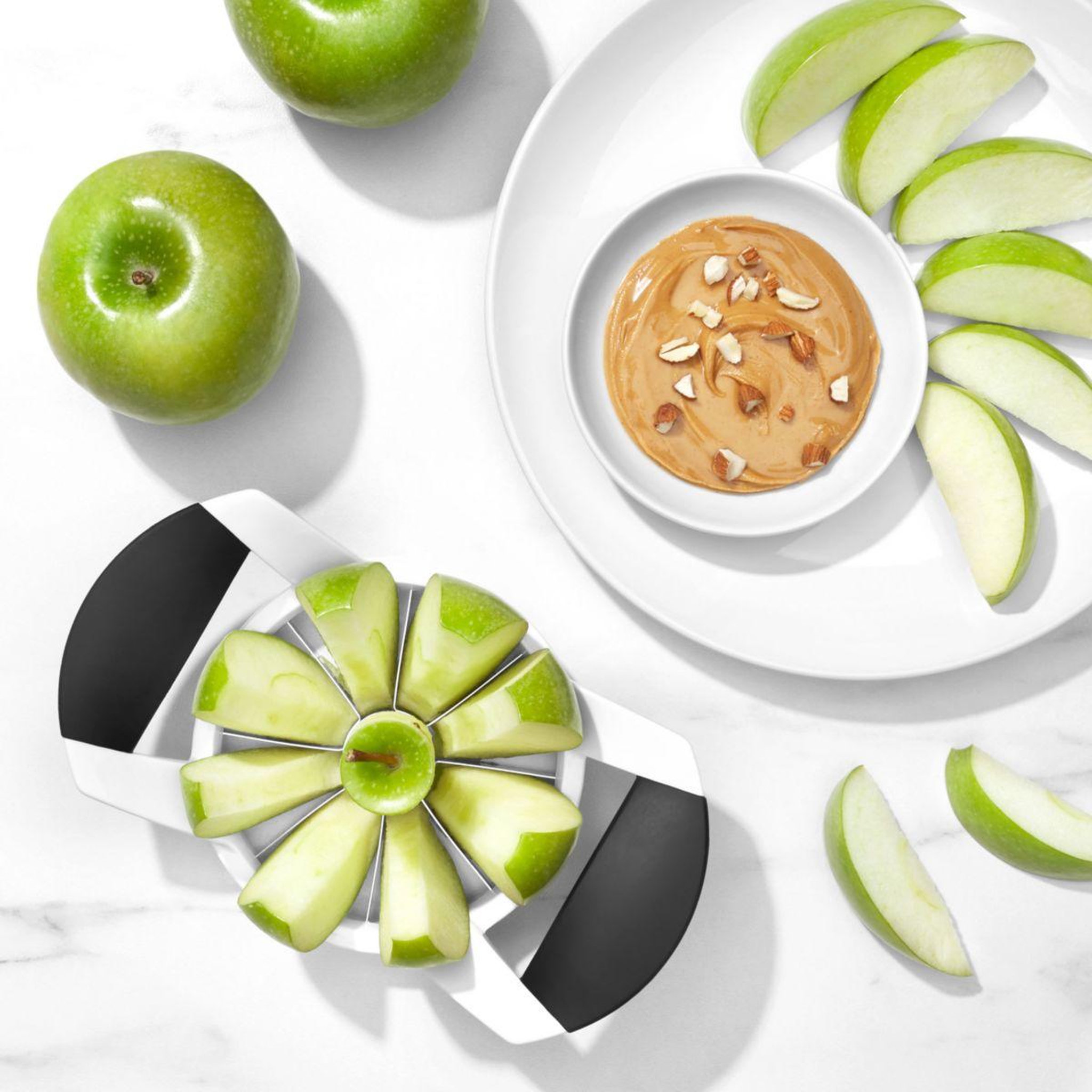 Voir la diapositive 5 : OXO Coupe fruits coupe pomme
