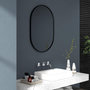 Voir la diapositive 4 : HOMCOM Miroir mural ovale dim. 60L x 90H cm cadre arrondi montage vertical/horizontal alu. noir