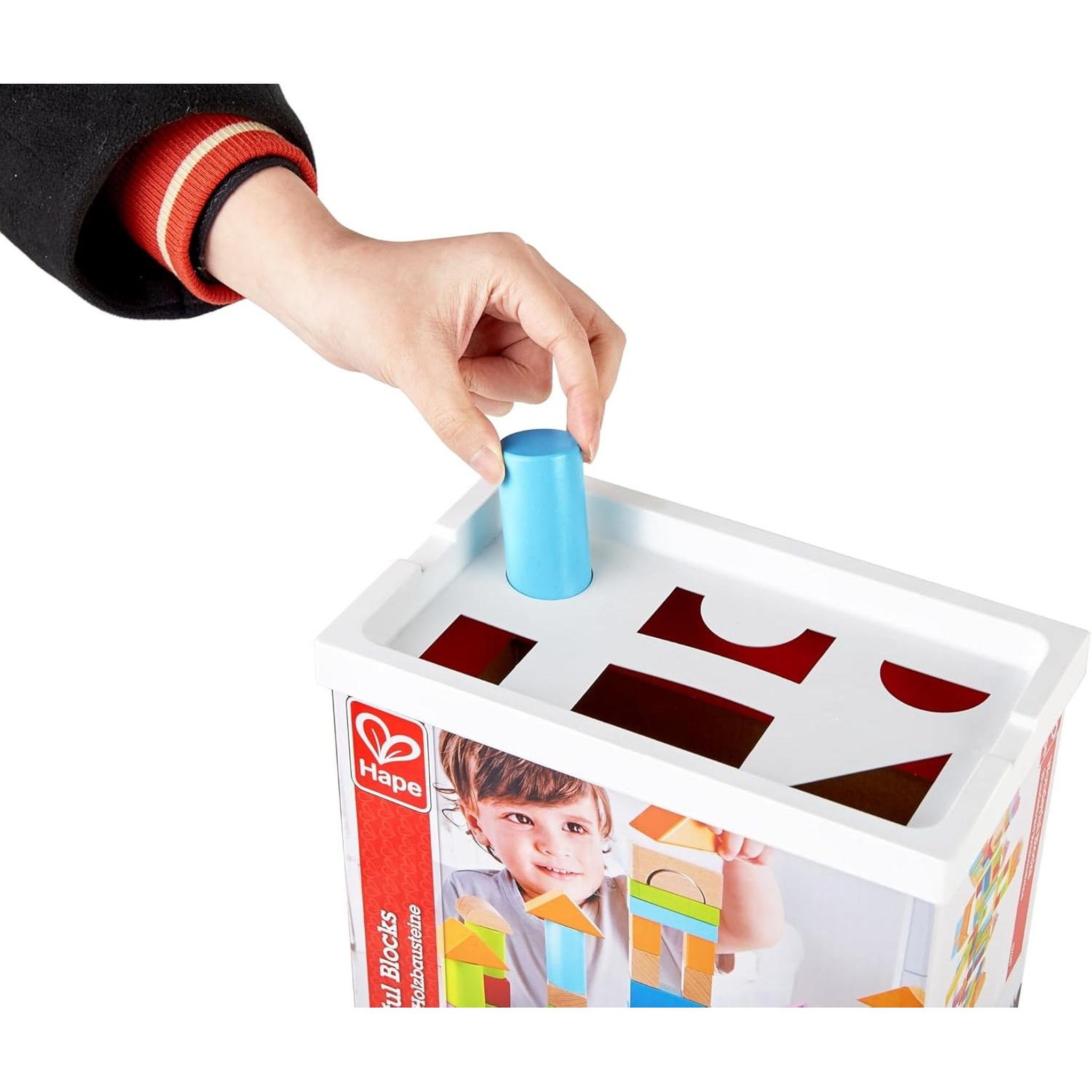 Voir la diapositive 5 : Hape Baril de 100 cubes en bois