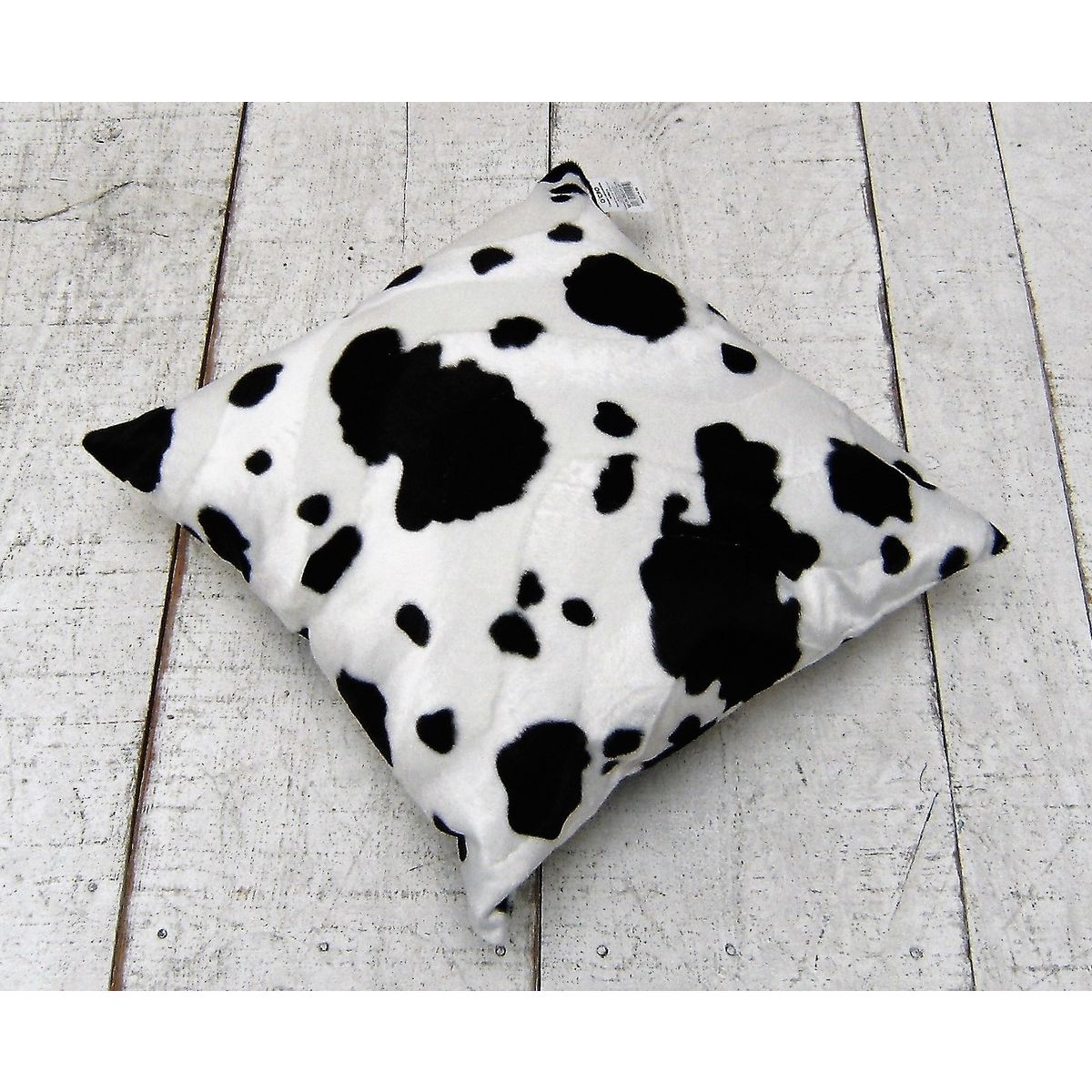 Coussin en velours déhoussable imitation fourrure vache