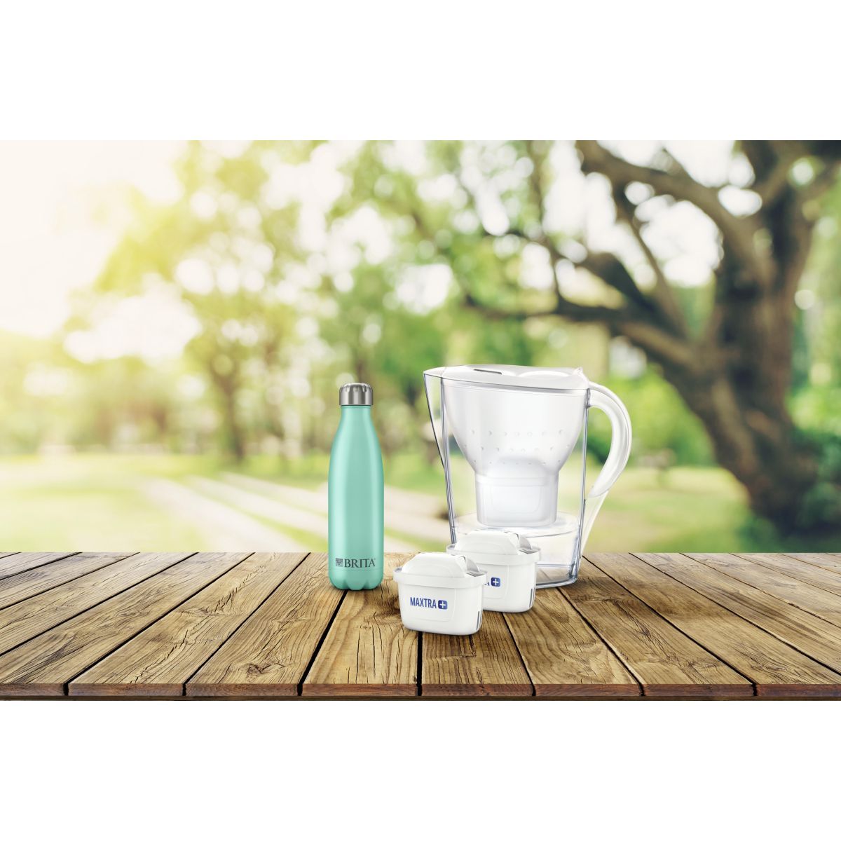 BRITA Carafe filtrante marella blanche + 1 bouteille isotherme bleu