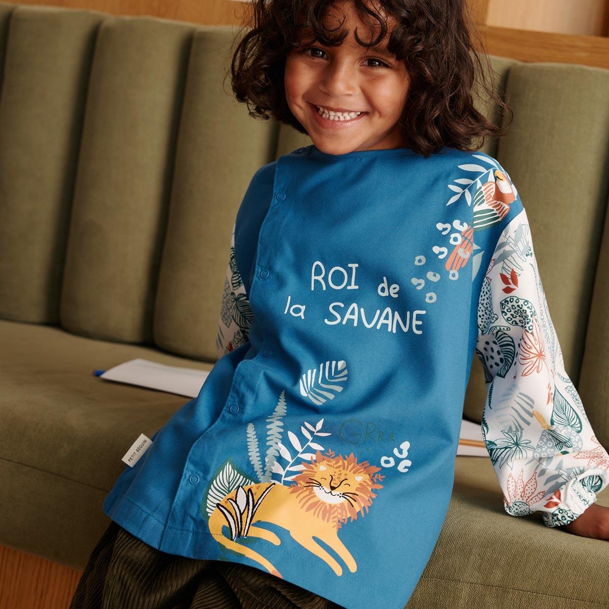 Voir la diapositive 4 : Petit Béguin Tablier enfant roi de la savane