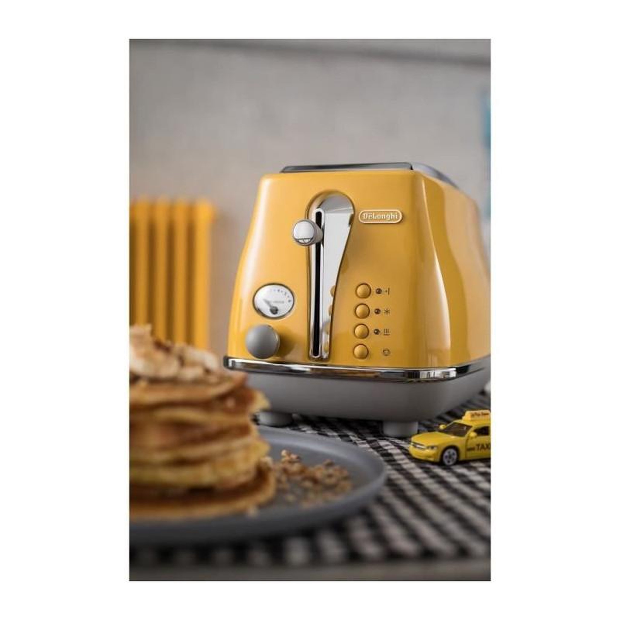 Voir la diapositive 5 : DELONGHI Toaster DELONGHI ICONA CAPITALS 2 tranches - 900W - Grille pain 3 fonctions - Chauffe viennoisseries inclus - Jaune