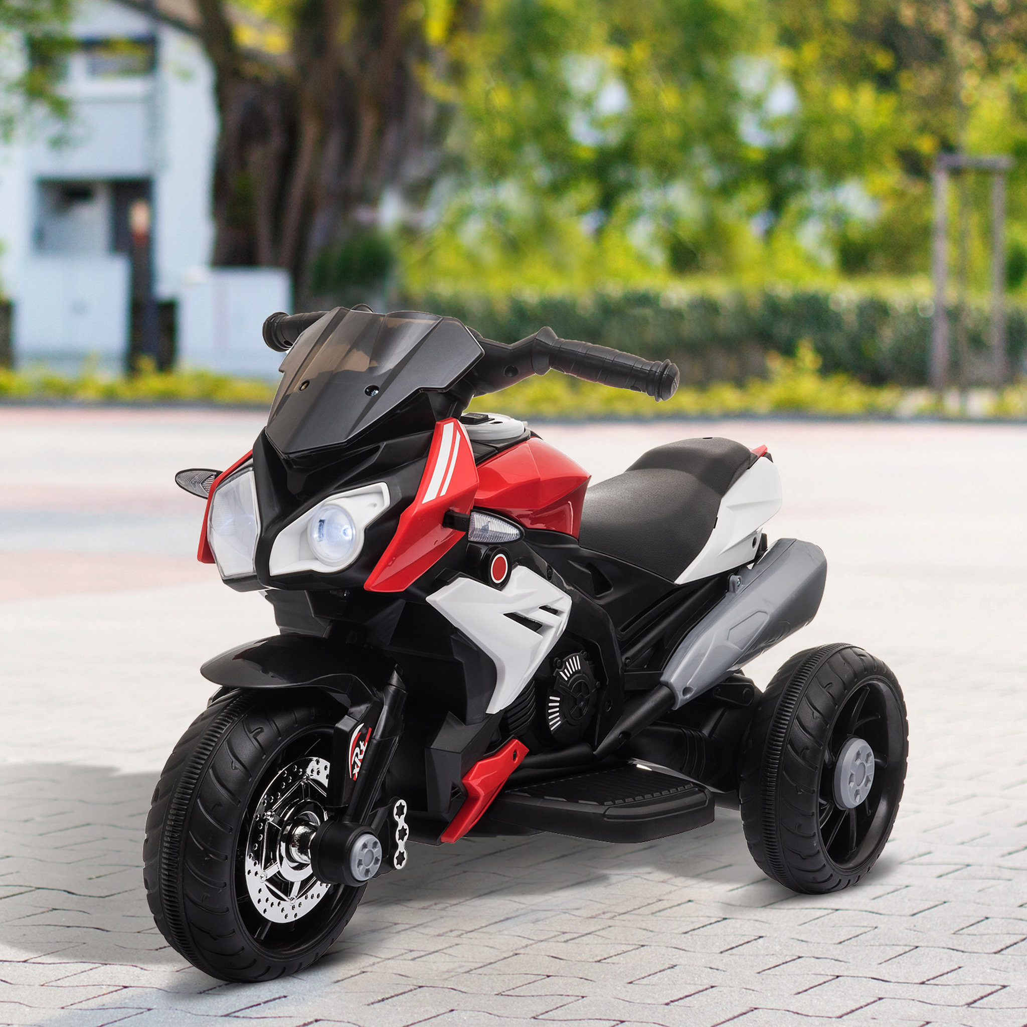 Voir la diapositive 2 : HOMCOM Moto électrique pour enfants 3 roues 6 V 3 Km/h effets lumineux et sonores rouge