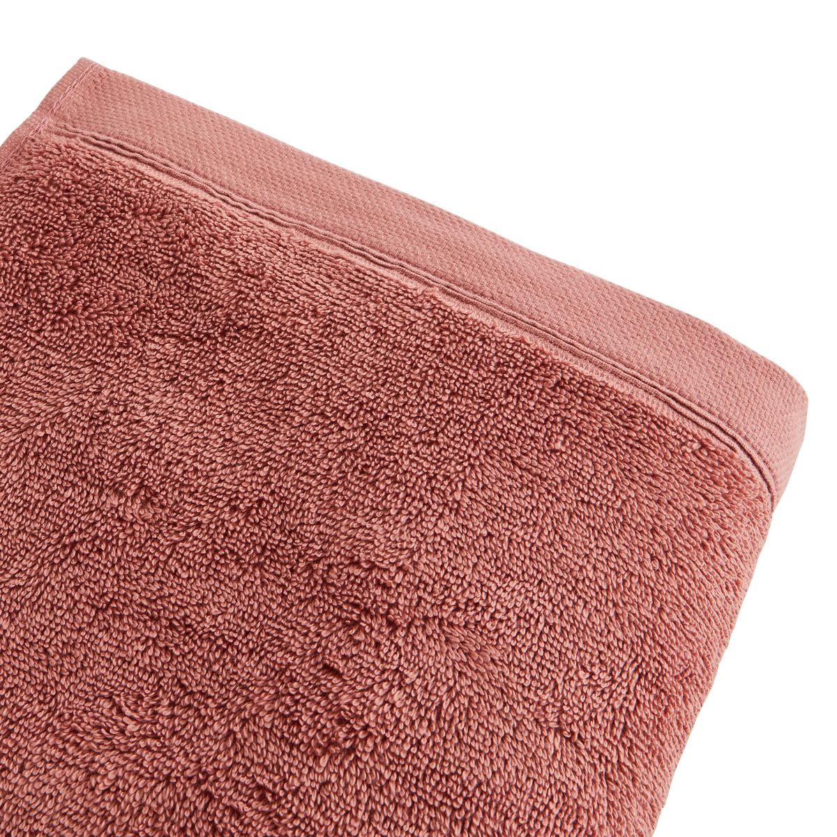 Serviette de toilette unie en coton 600 g/m²