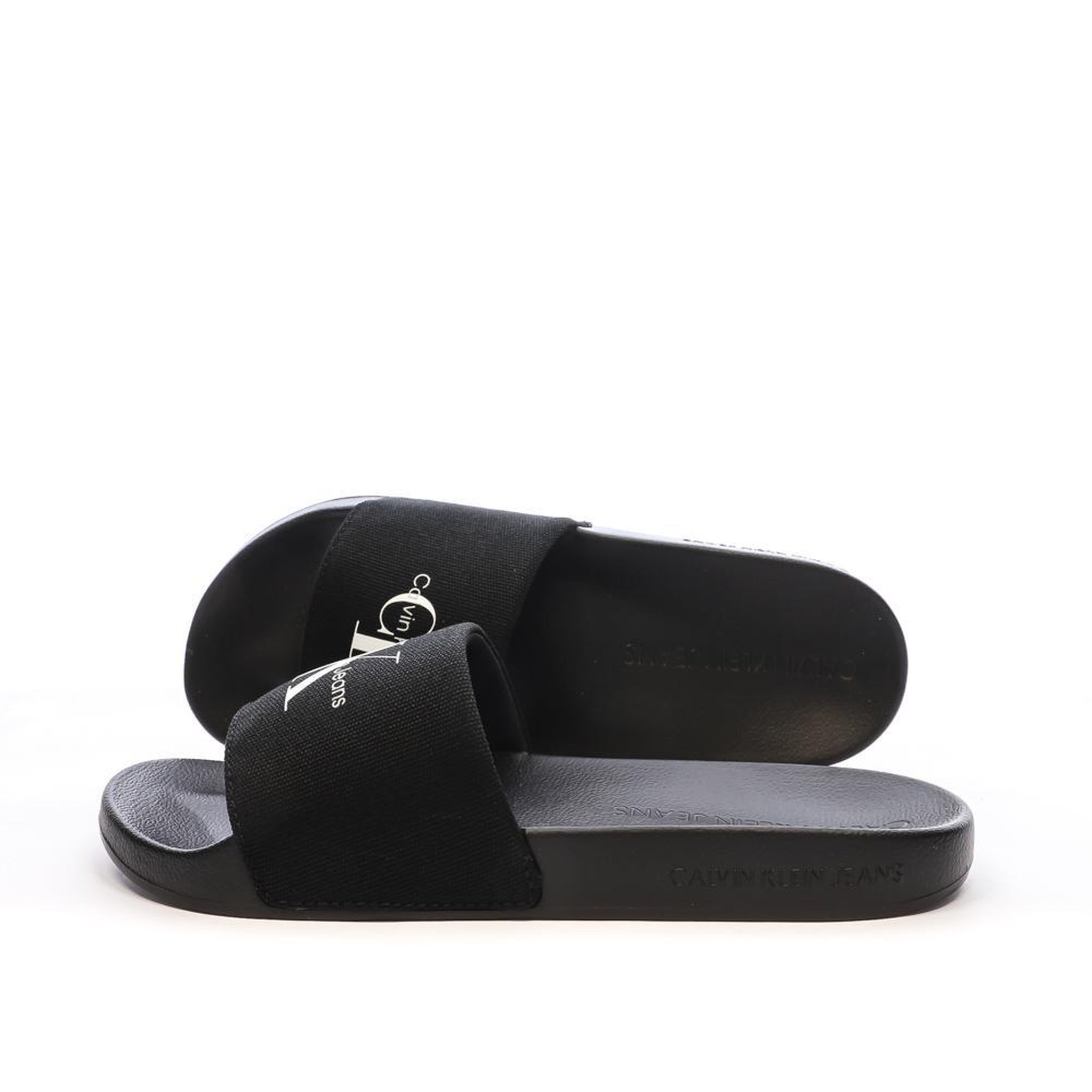 CALVIN KLEIN JEANS Claquettes es Homme Calvin Klein Jeans YW0YW01835. Coloris disponibles : Noir