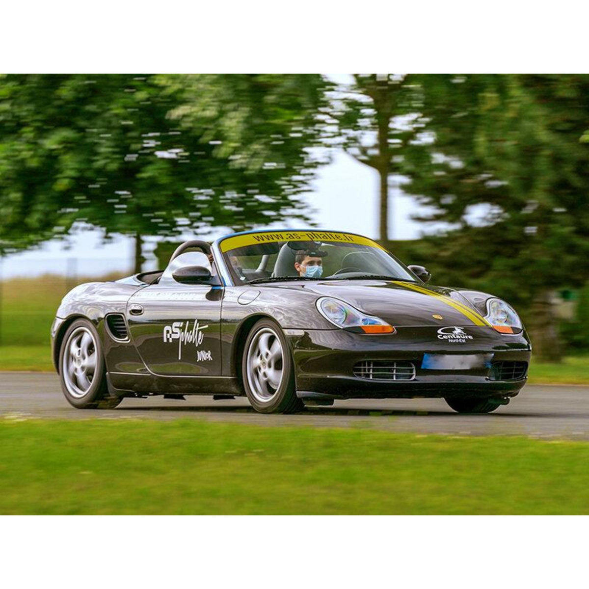 Smartbox Stage de conduite enfant : 2 tours au volant d'une Clio RS et 2 séries en Porsche Boxster - Coffret Cadeau Sport & Aventure