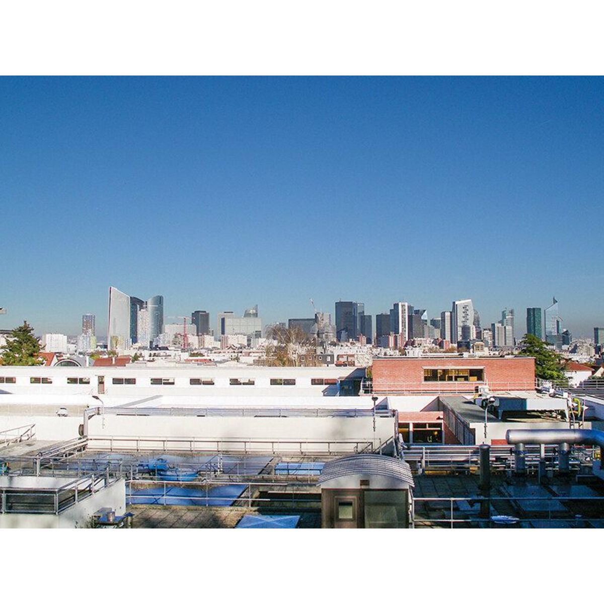 Smartbox Visite privée de 2h30 de la Défense pour 4 - Coffret Cadeau Sport & Aventure