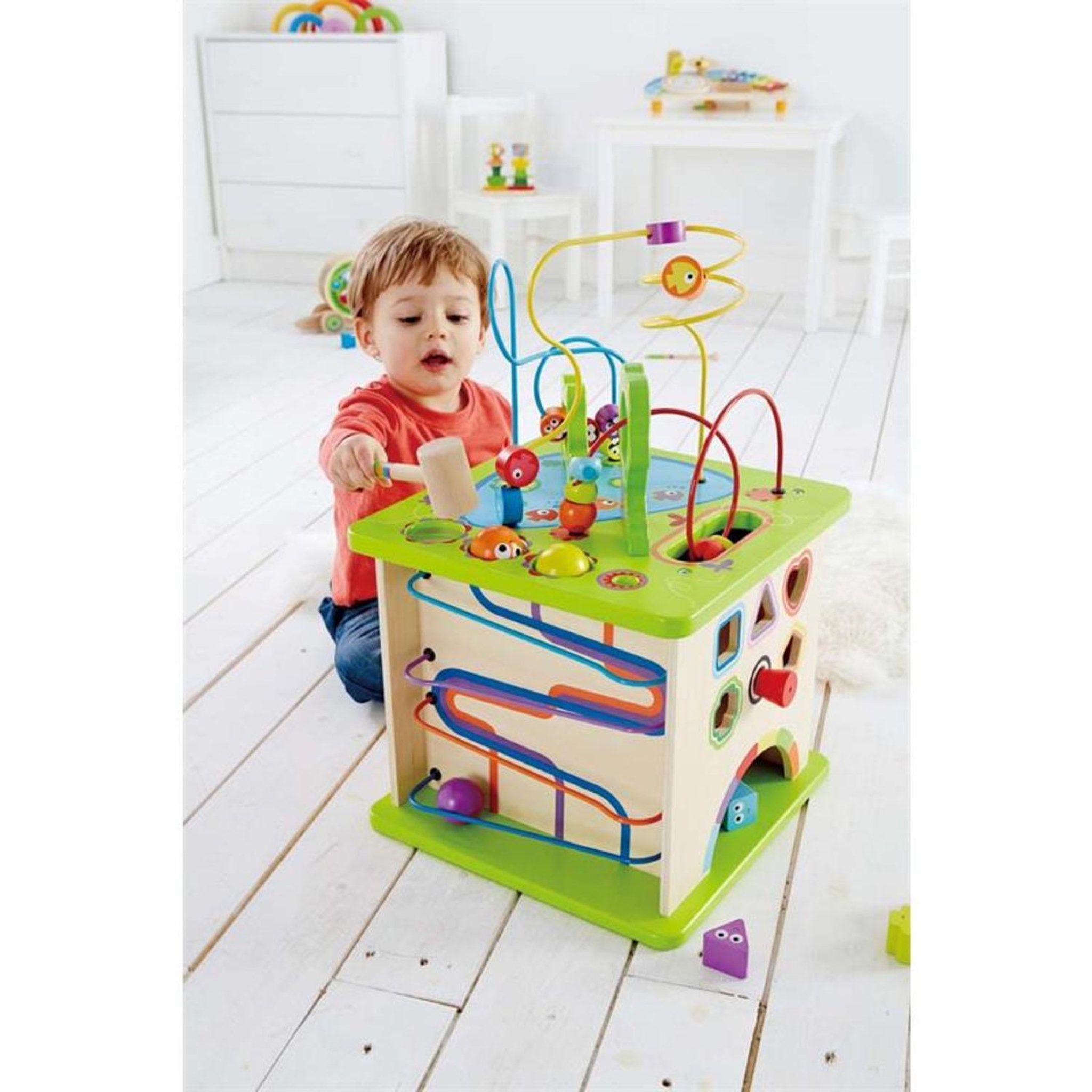 Voir la diapositive 4 : Hape Cube d'activités Hape en bois multicolore
