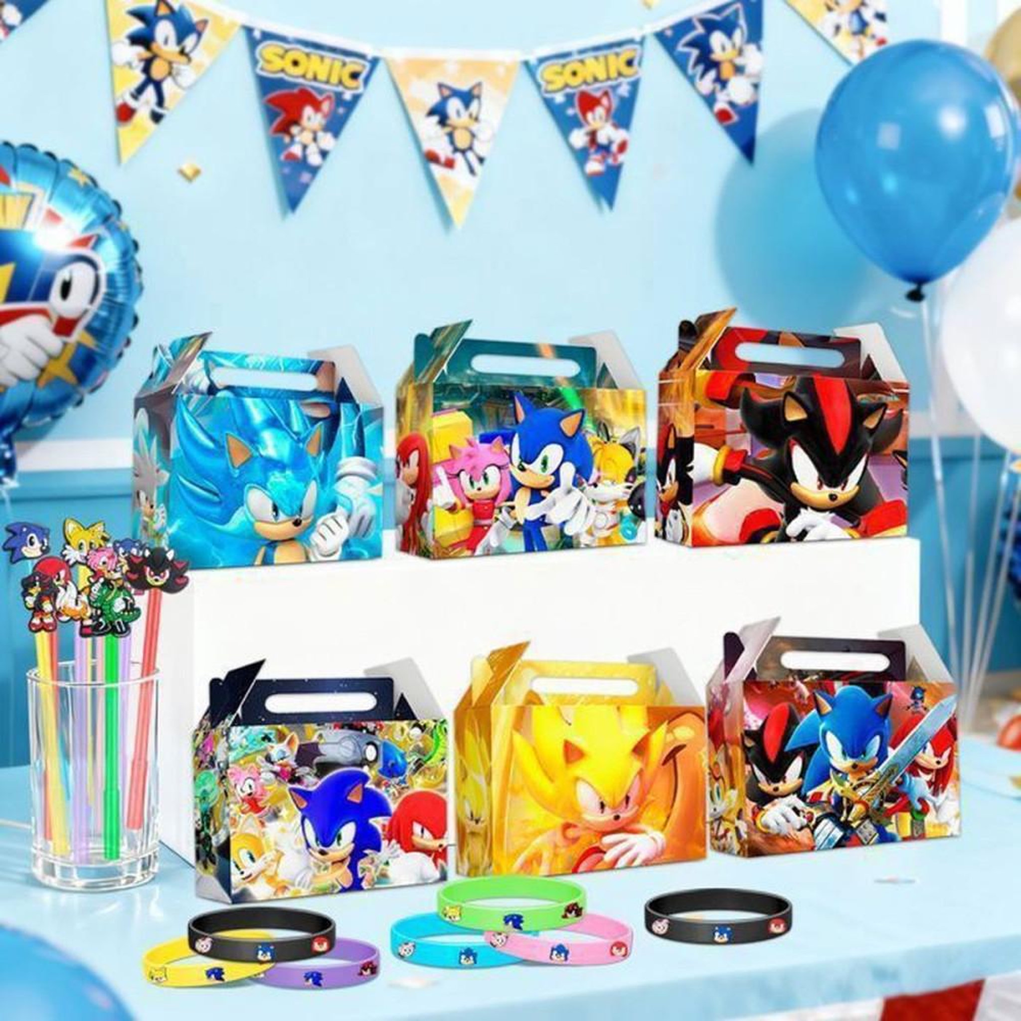 Voir la diapositive 4 : Kit fête à thème Sonic pour 12 enfants : 12 sacs cadeaux, 25 tatouages éphémères, badges, stickers et carnets