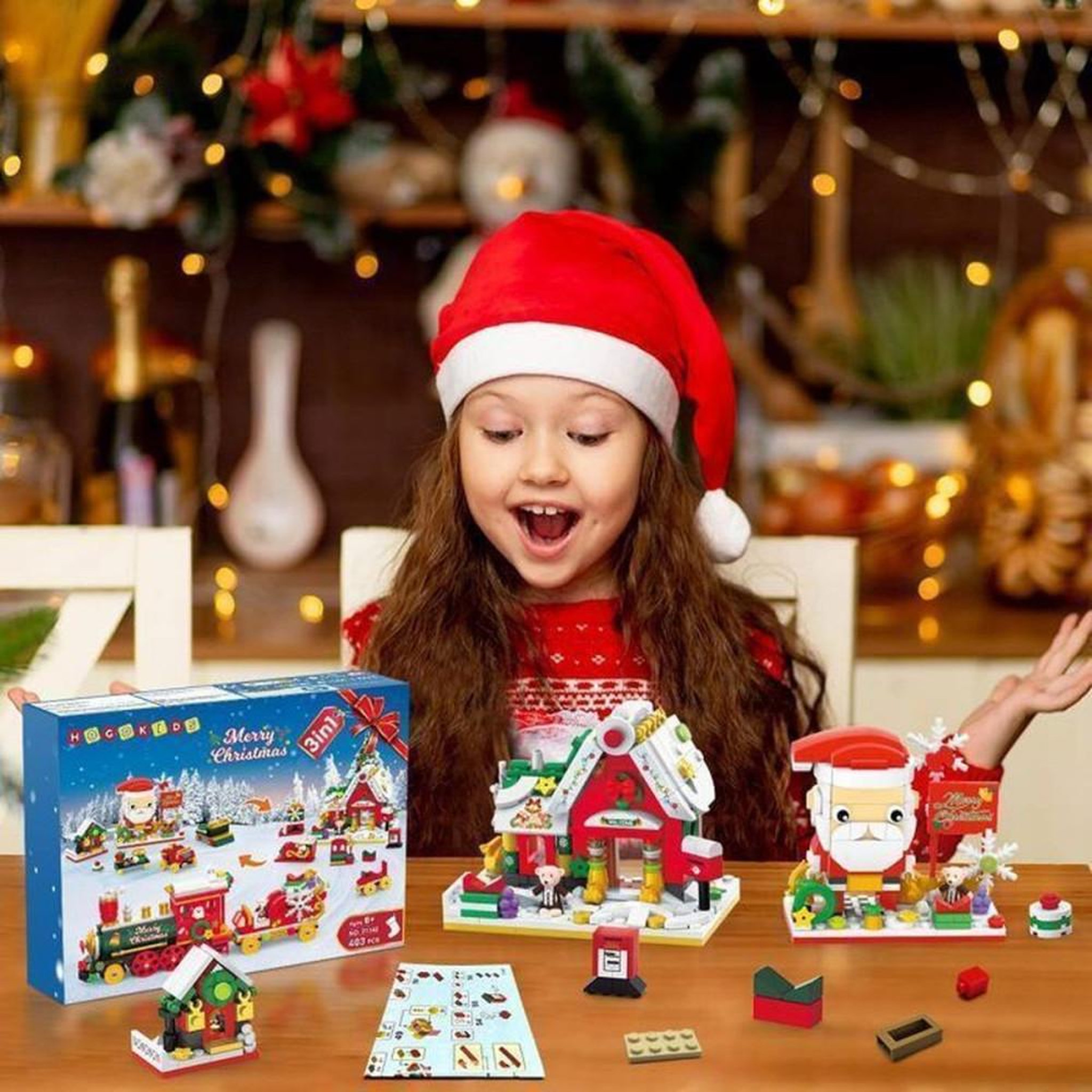Voir la diapositive 3 : Jouet de construction Noël 3-en-1 403 pièces avec LED, modèles Père Noël, train et cabane