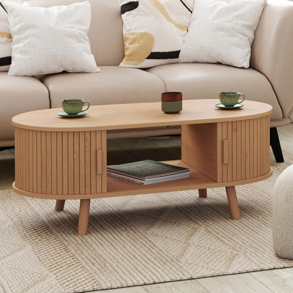 ID MARKET Table basse ovale ROMIE 100 cm 2 portes coulissantes lattes tasseau bois coloris chêne