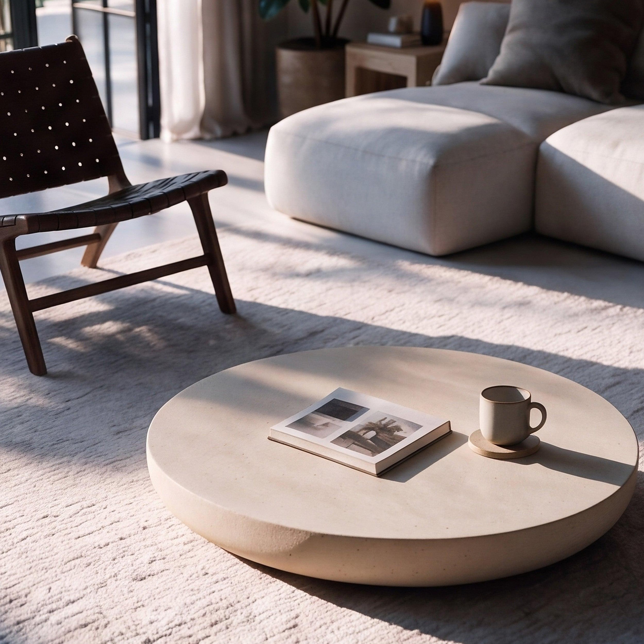 Voir la diapositive 3 : MAISON PAVANE Table basse ronde beige en fibre d'argile effet béton d100 cm-milos