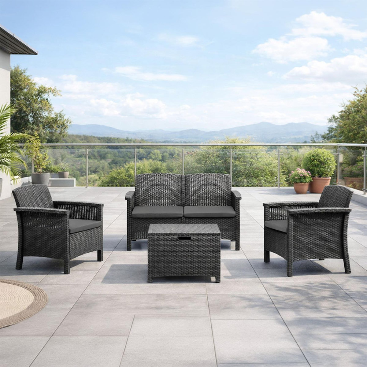 CONCEPT USINE Salon de jardin 4 places effet résine tressée gris anthracite avec table basse MANIZA