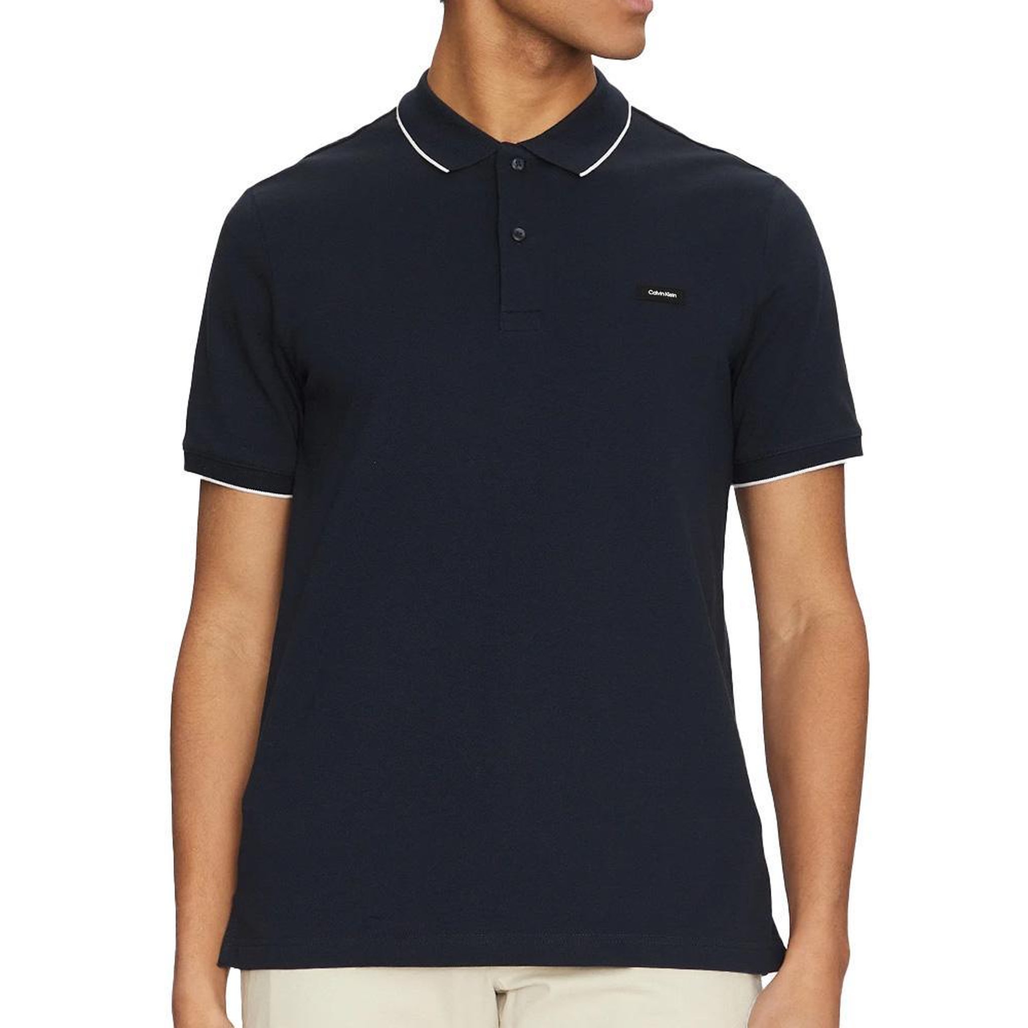 CALVIN KLEIN JEANS Polo Marine Homme Calvin Klein Jeans Stretch. Coloris disponibles : Bleu