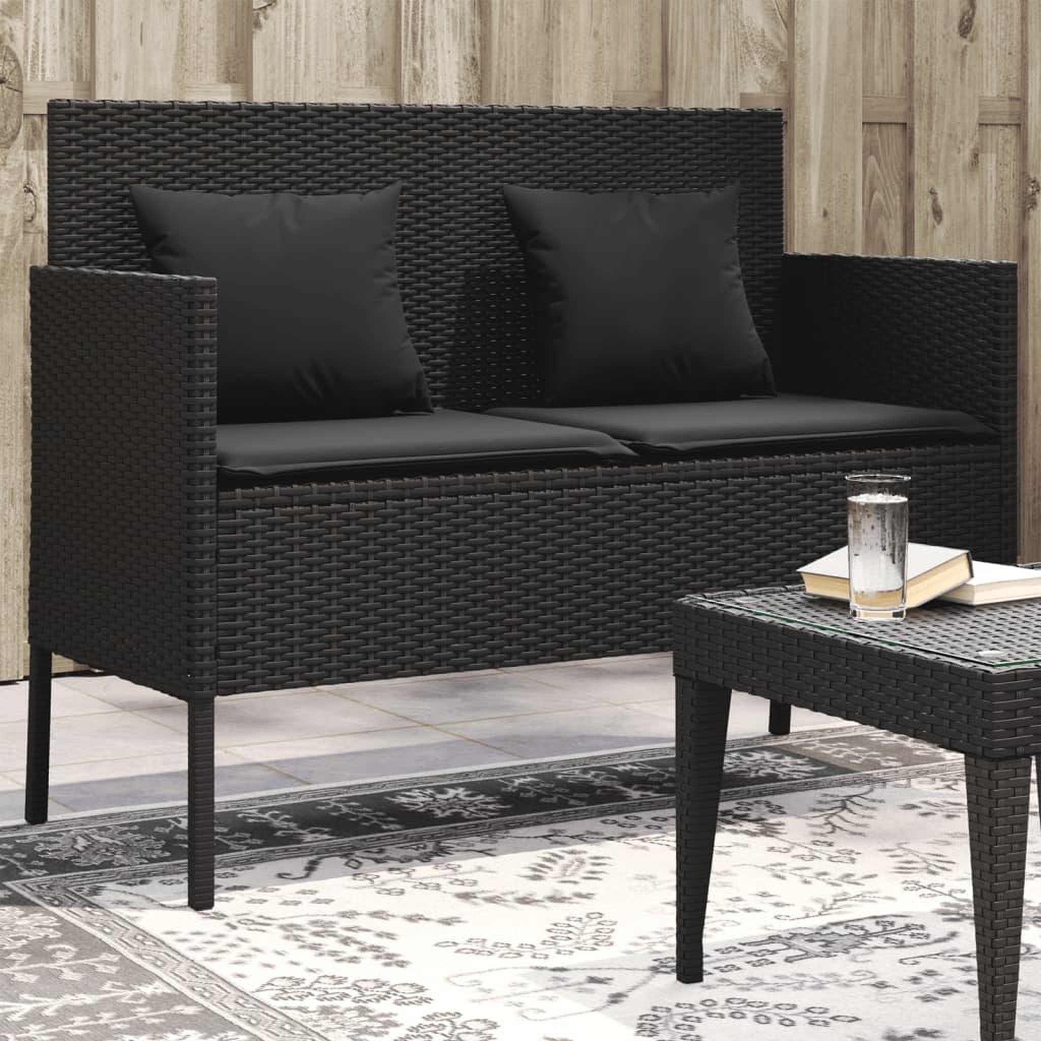 VIDAXL Banc de jardin avec coussins noir resine tressee