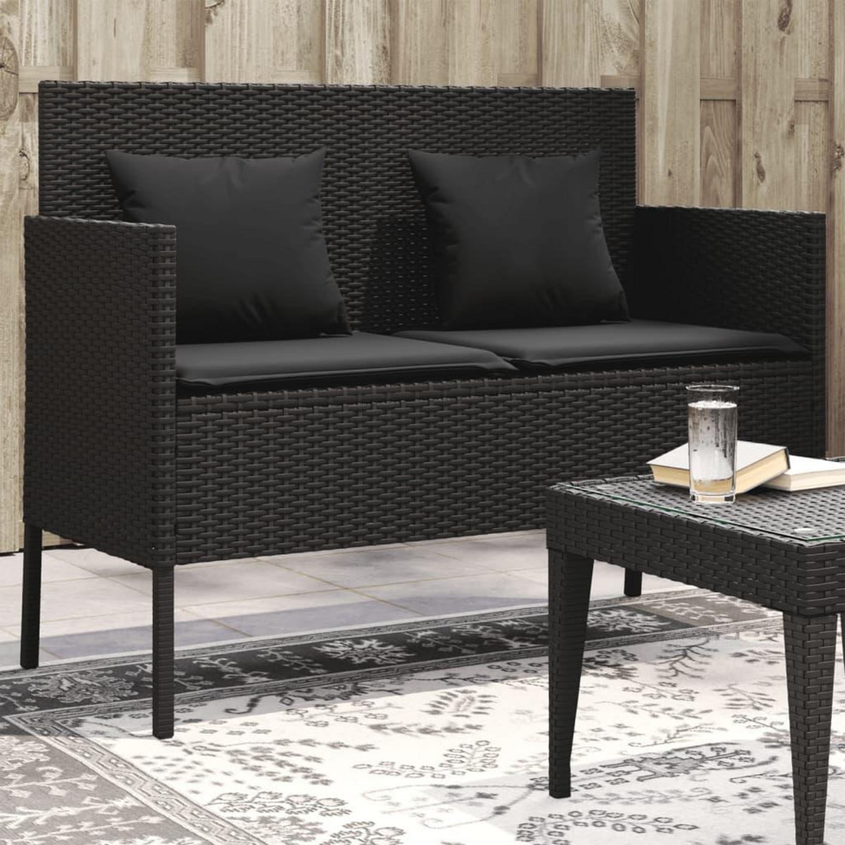 VIDAXL Banc de jardin avec coussins noir resine tressee