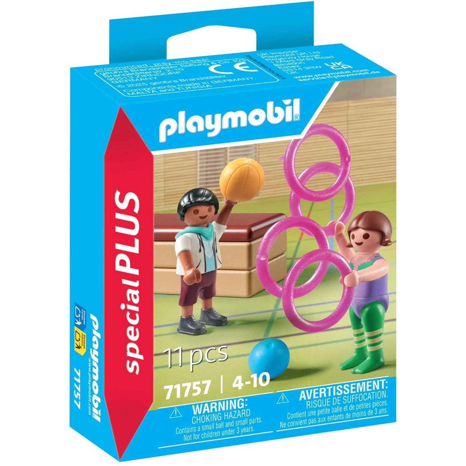 Duo d'enfants avec matériel de gymnastique