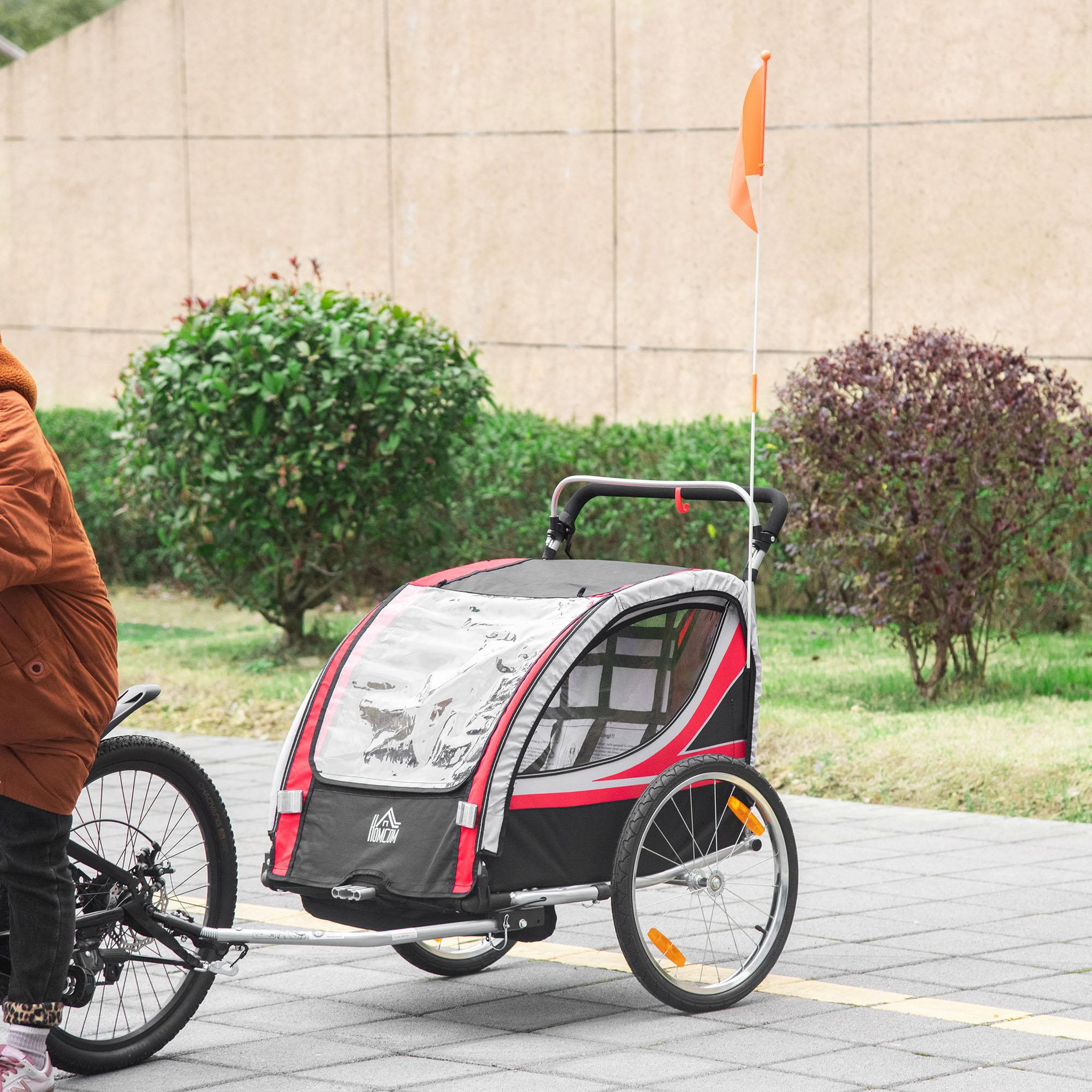 Voir la diapositive 2 : HOMCOM Remorque vélo jogger 2 en 1 pour enfant drapeau roue avant pivotante réflecteurs et barre d'attelage inclus rouge noir