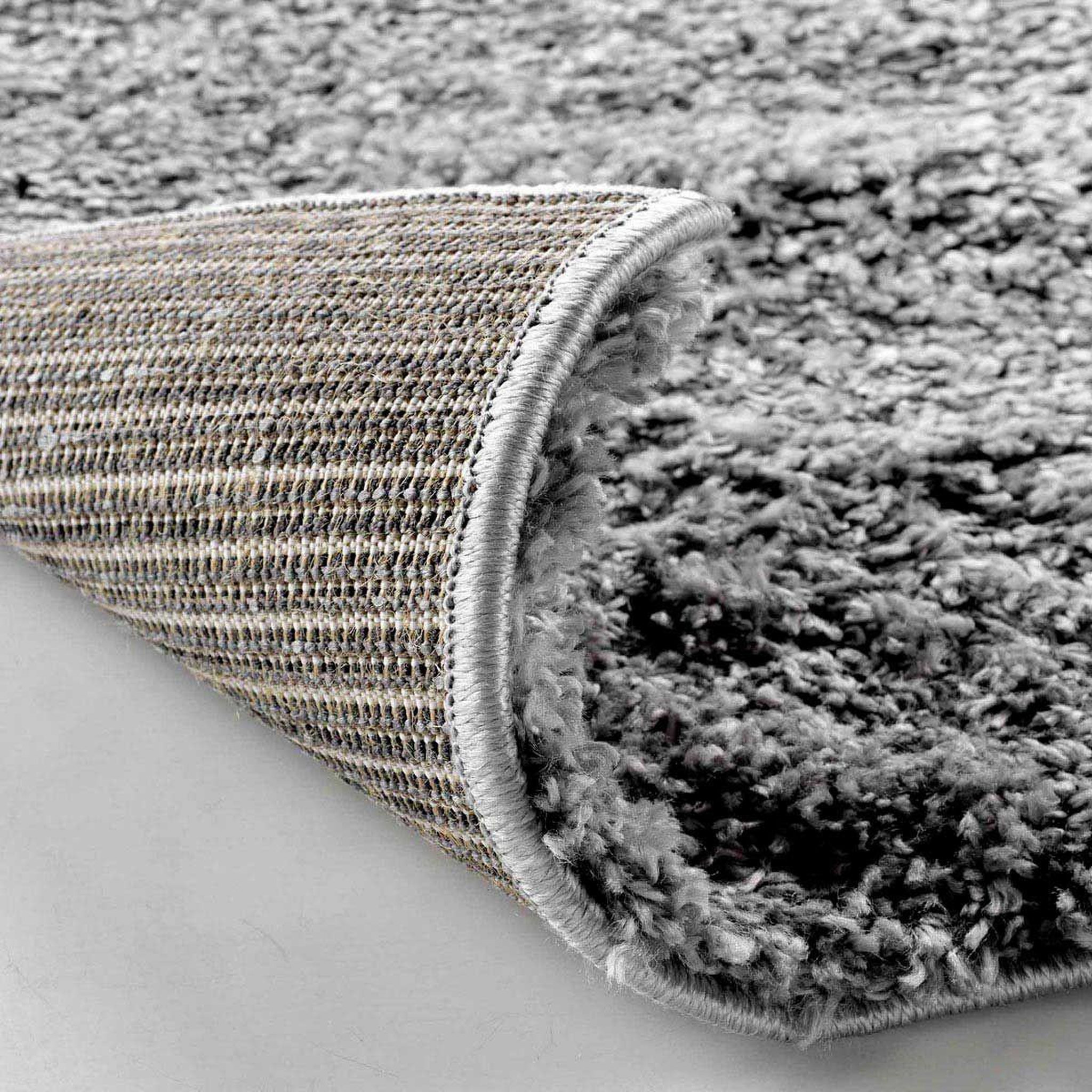 Voir la diapositive 5 : Douceur d'Intérieur Tapis shaggy uni  tango  60x110cm gris